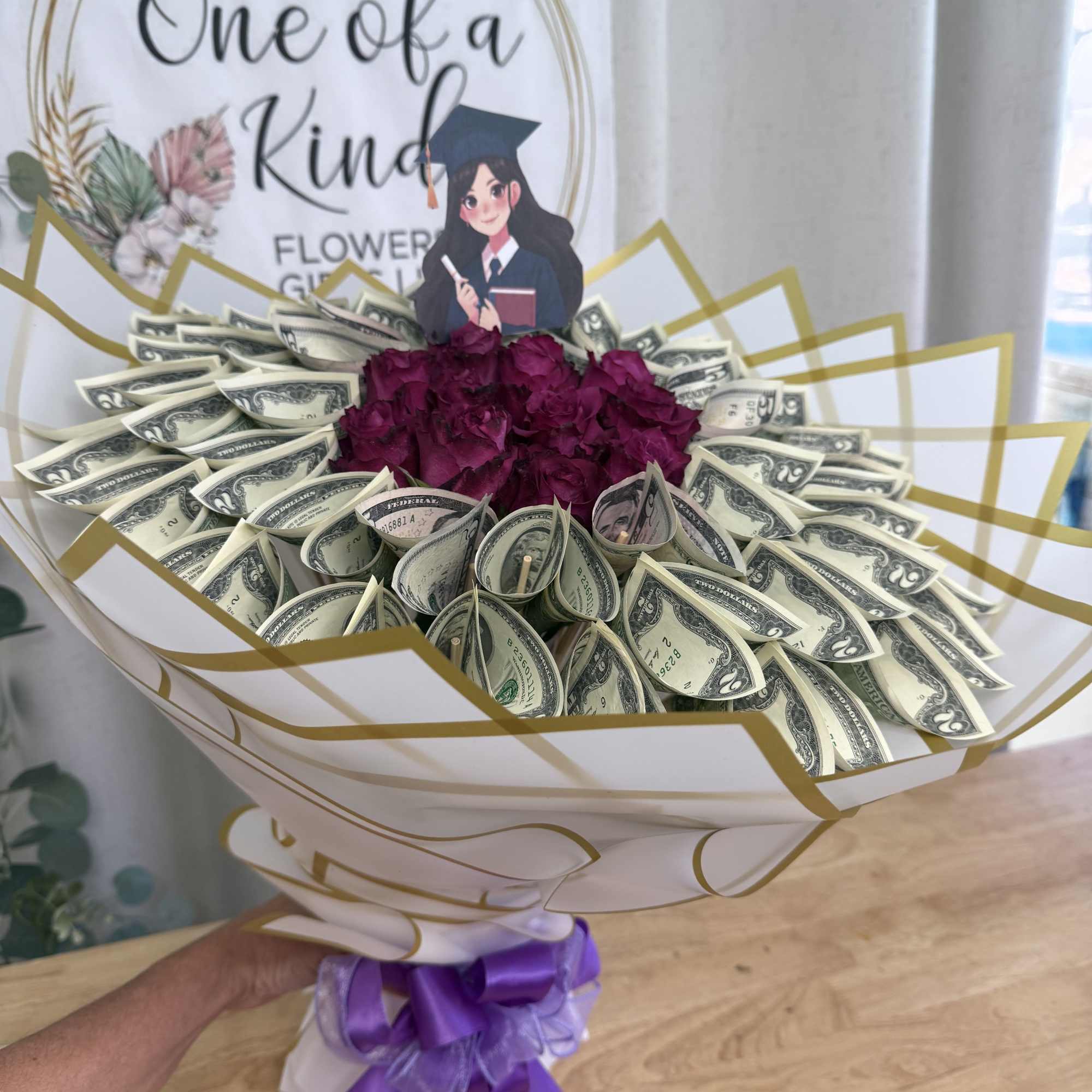 A luxurious bouquet made with a dozen real roses and real $1, photo 2 of 2