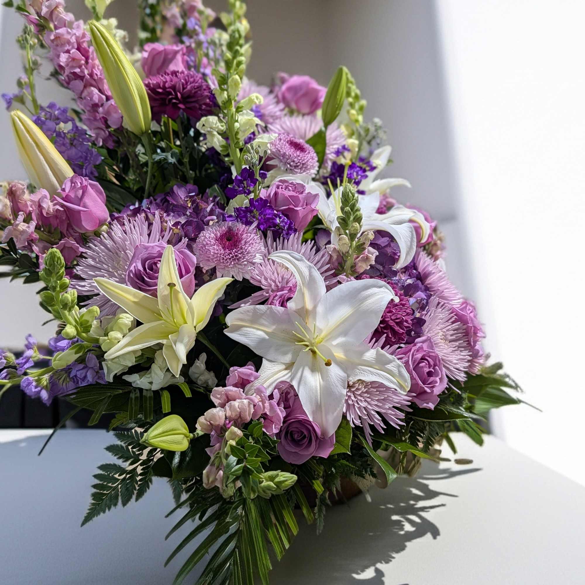 Lavender and white mixed bouquet with lilies and roses