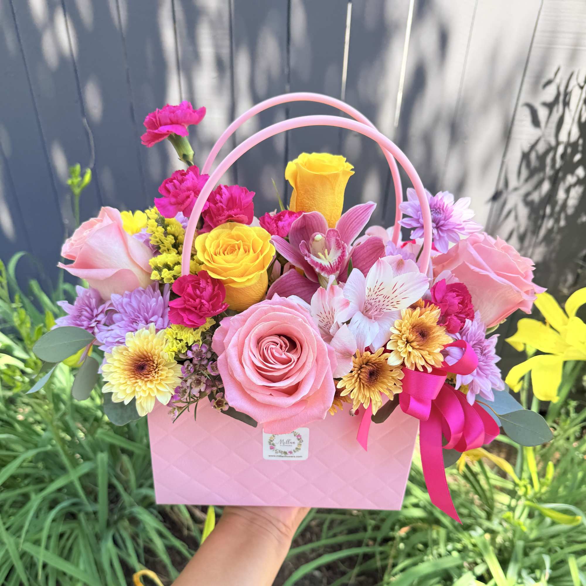 Beautiful floral bag crafted with beautiful Ecuadorian roses, alstroemerias, fancy daisies, 