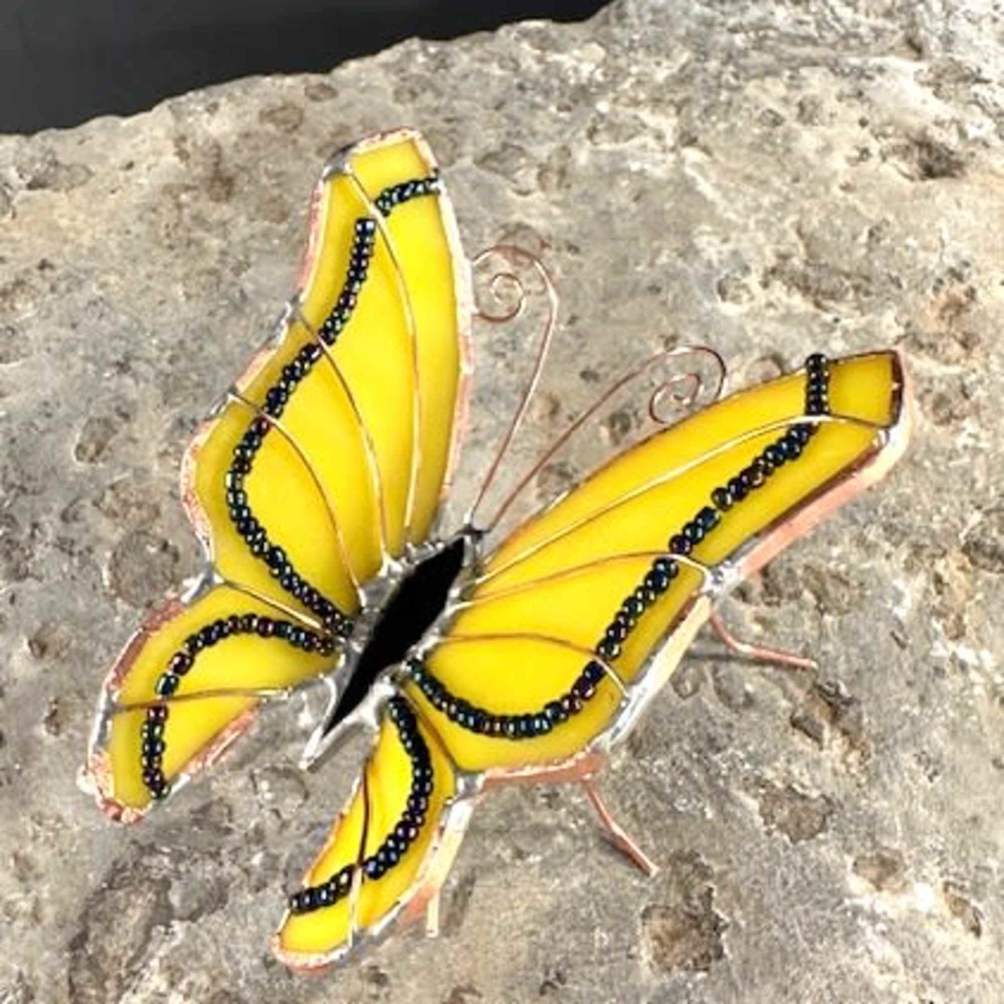 A bright yellow stained-glass butterfly catches the eye first - perfect as, photo 2 of 4