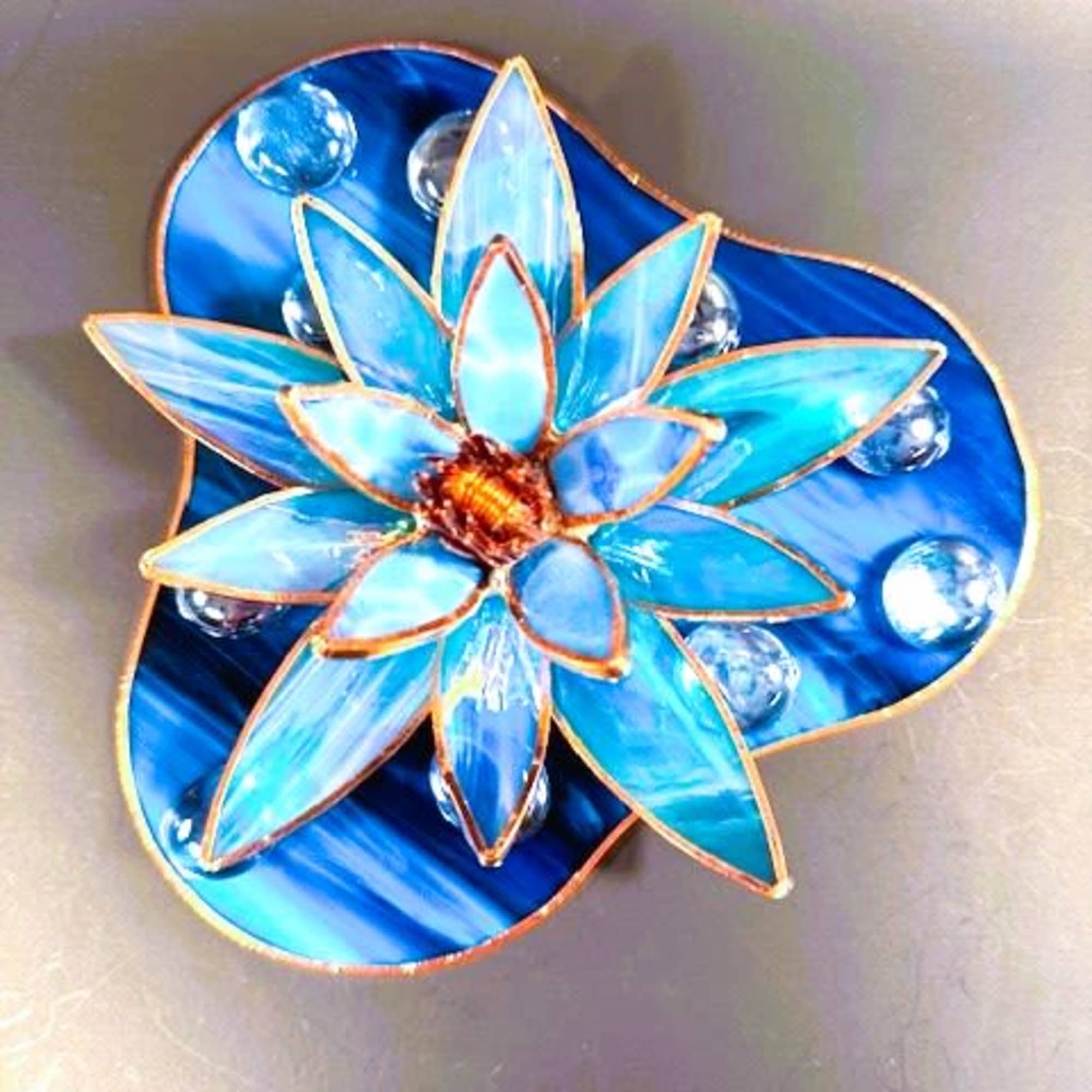 A marbled blue-and-teal stained-glass lotus brings a quiet, reflective moment to any, photo 2 of 2