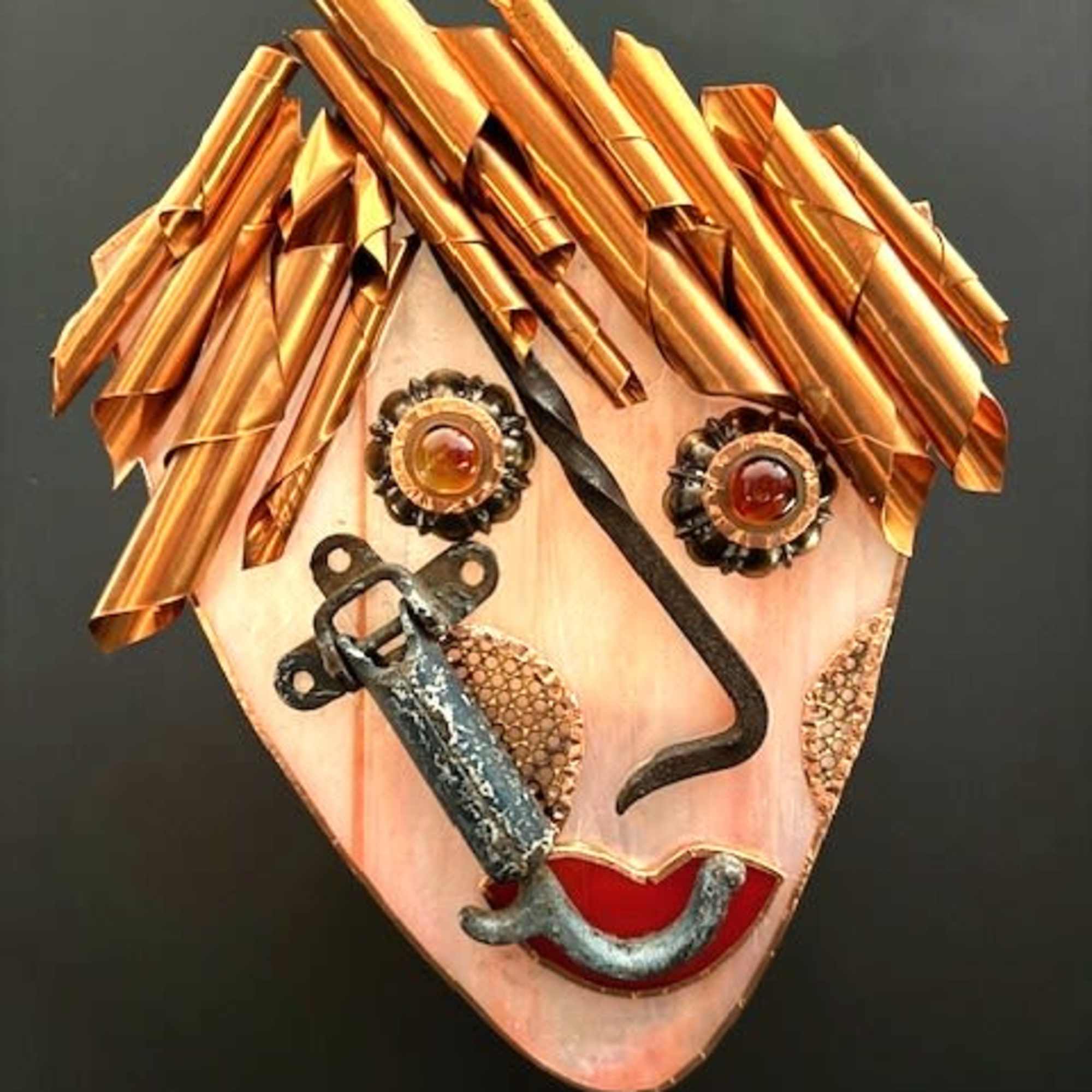 A playful metal wall sculpture that reads like wearable art - this