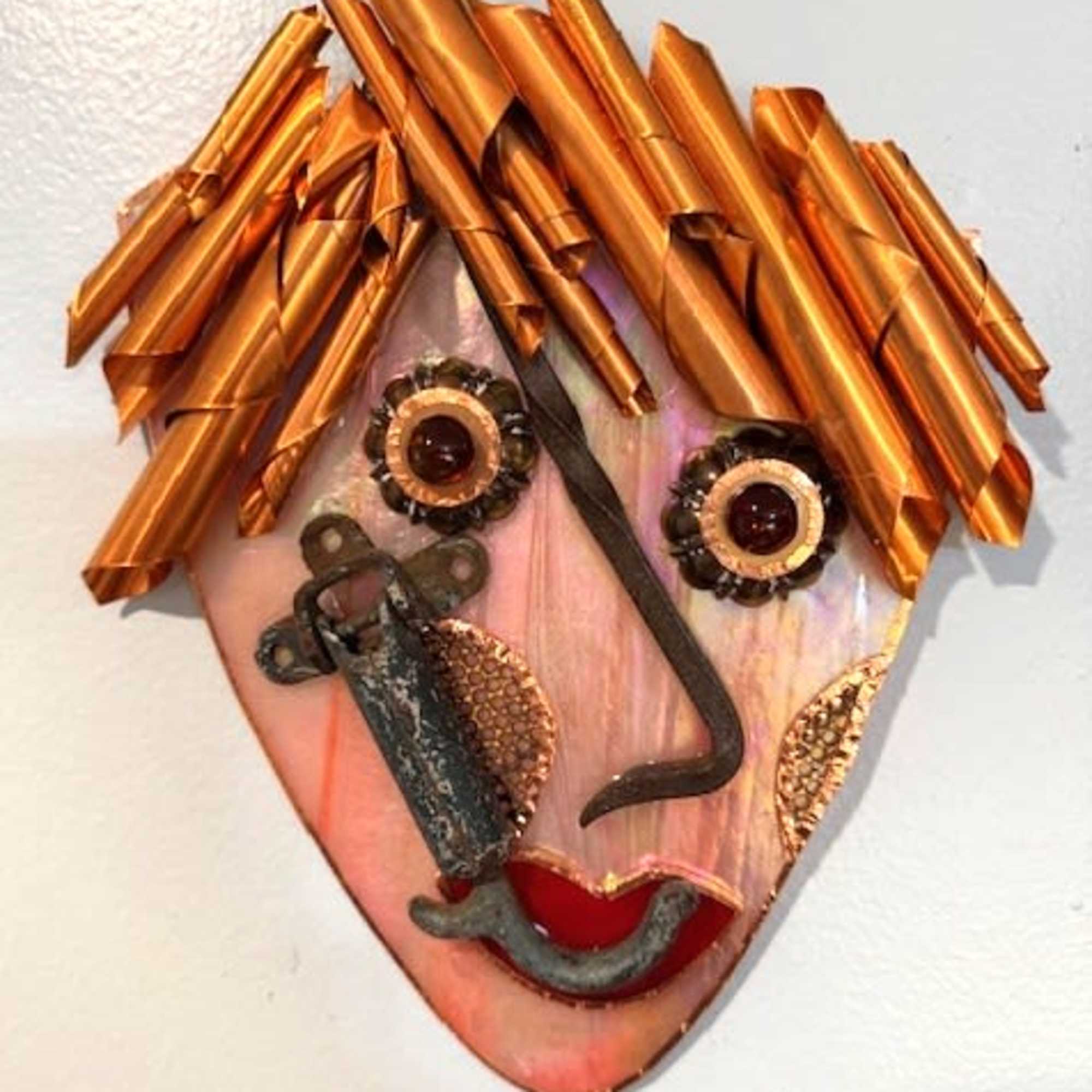 A playful metal wall sculpture that reads like wearable art - this, photo 2 of 2