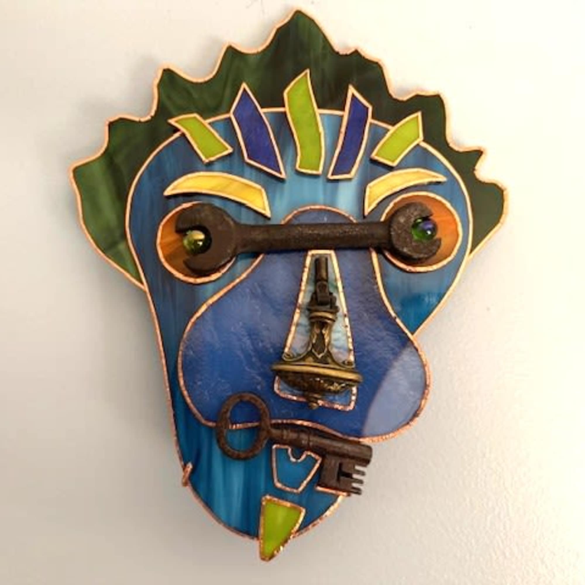 A playful mixed-media wall arrangement that reads like a bright, abstract portrait, photo 2 of 2