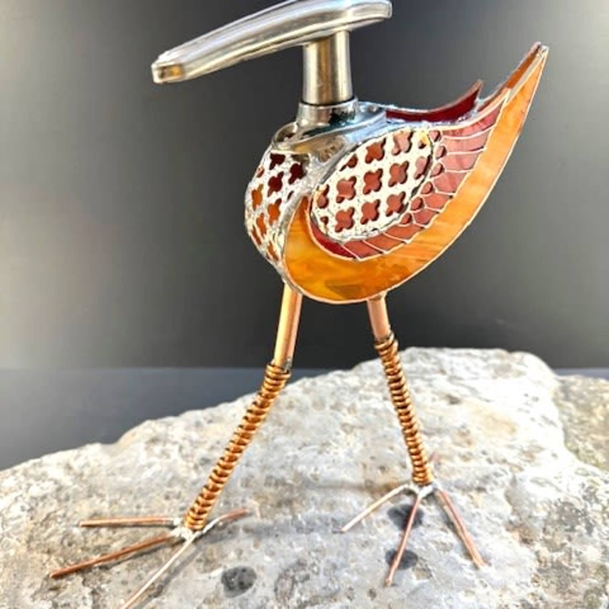 A playful metal-and-glass bird that reads like a museum sculpture and a, photo 2 of 2