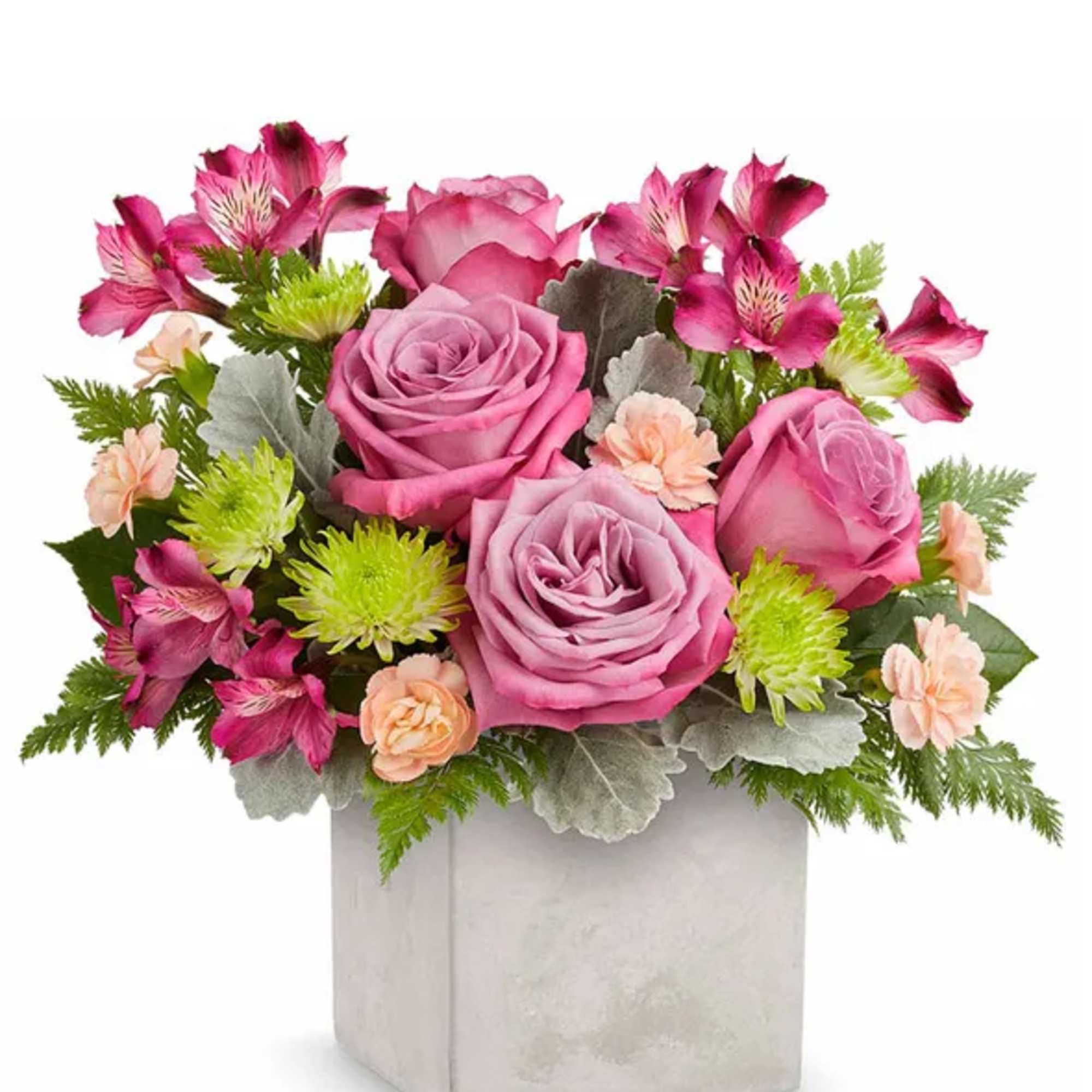 Pink roses and alstroemeria in a square vase