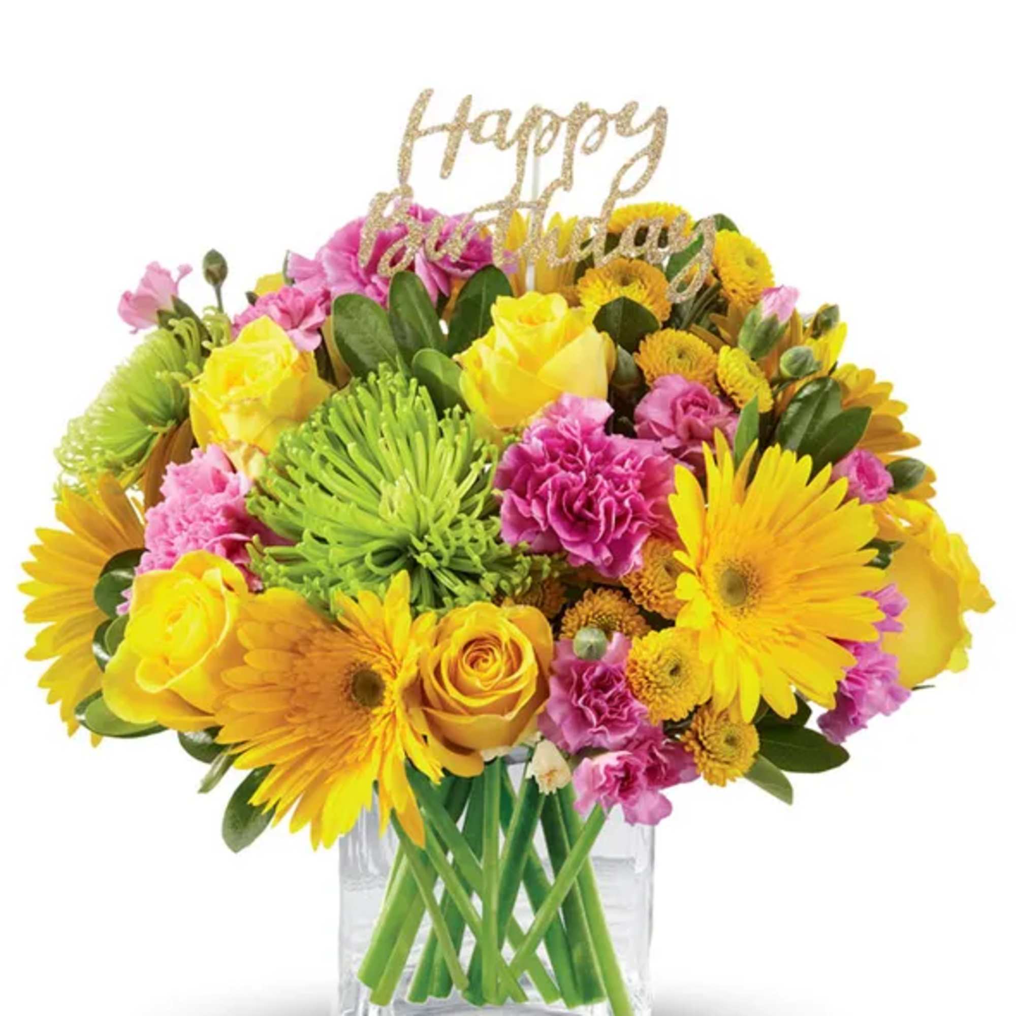 Bright mixed bouquet in a clear vase with a glittery "Happy Birthday" topper