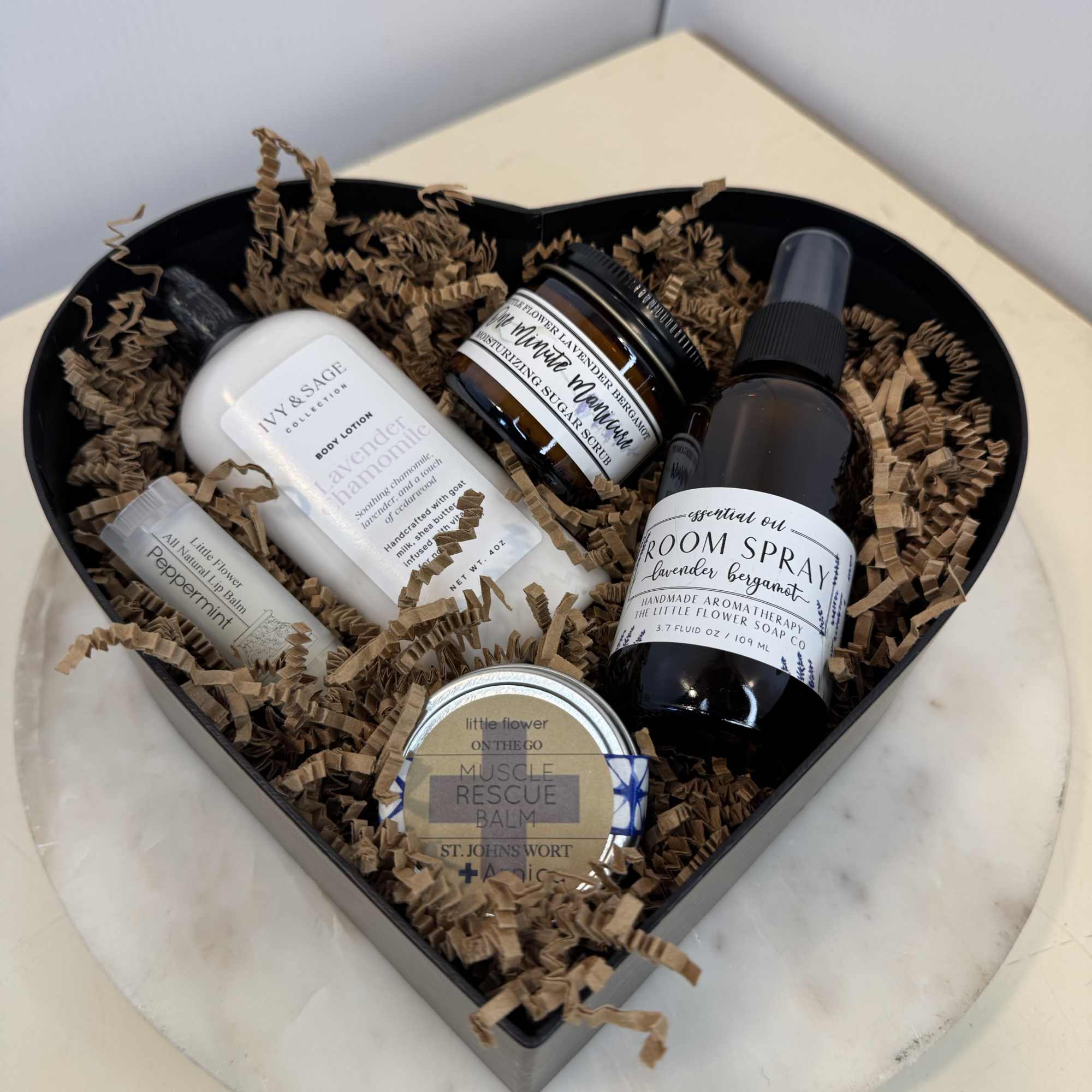 Heart-shaped gift box with lavender bath and body products