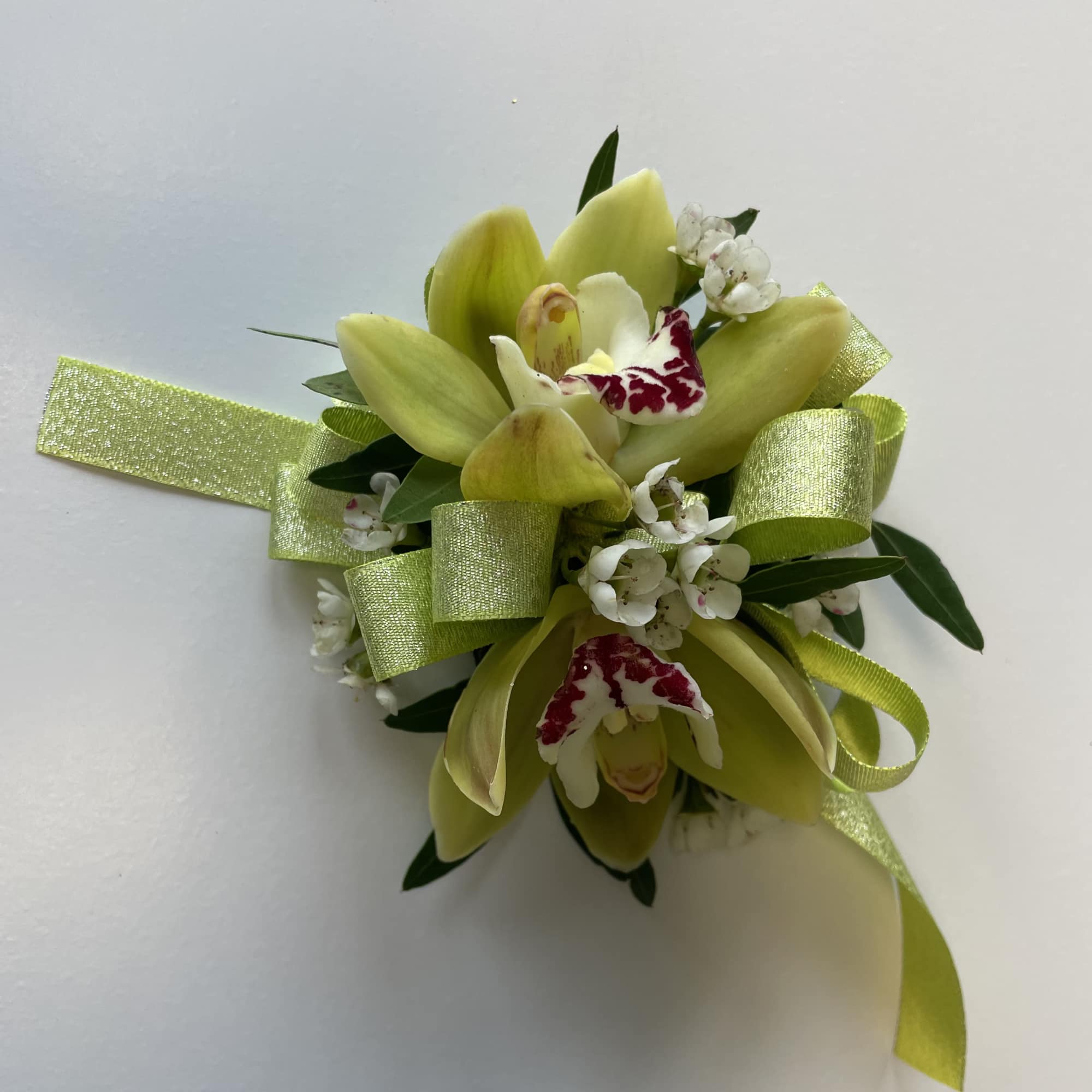 A beautiful Mini Cymbidium Orchid Corsage for Prom or Homecoming girls. 