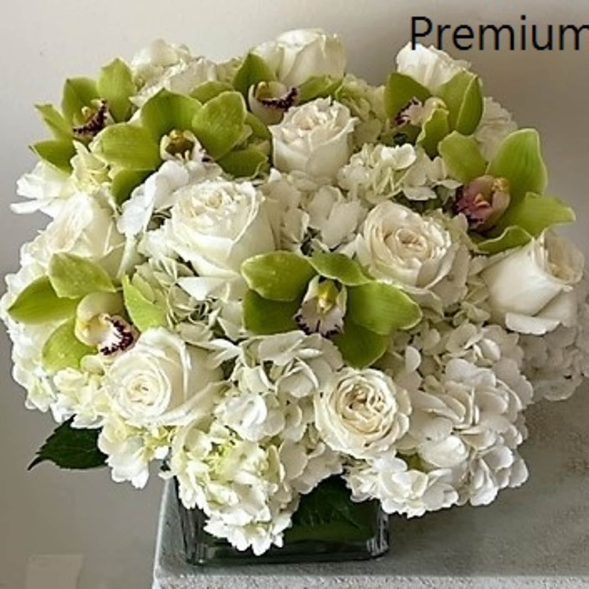 White Roses with White Hydrangeas mixed with green Cymbidium Orchid flowers. Arranged, photo 3 of 3