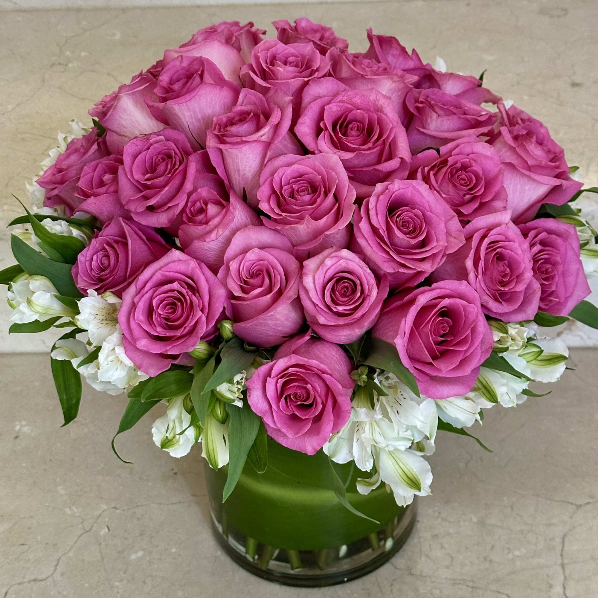 24 Pink Roses Compact arranged in a vase