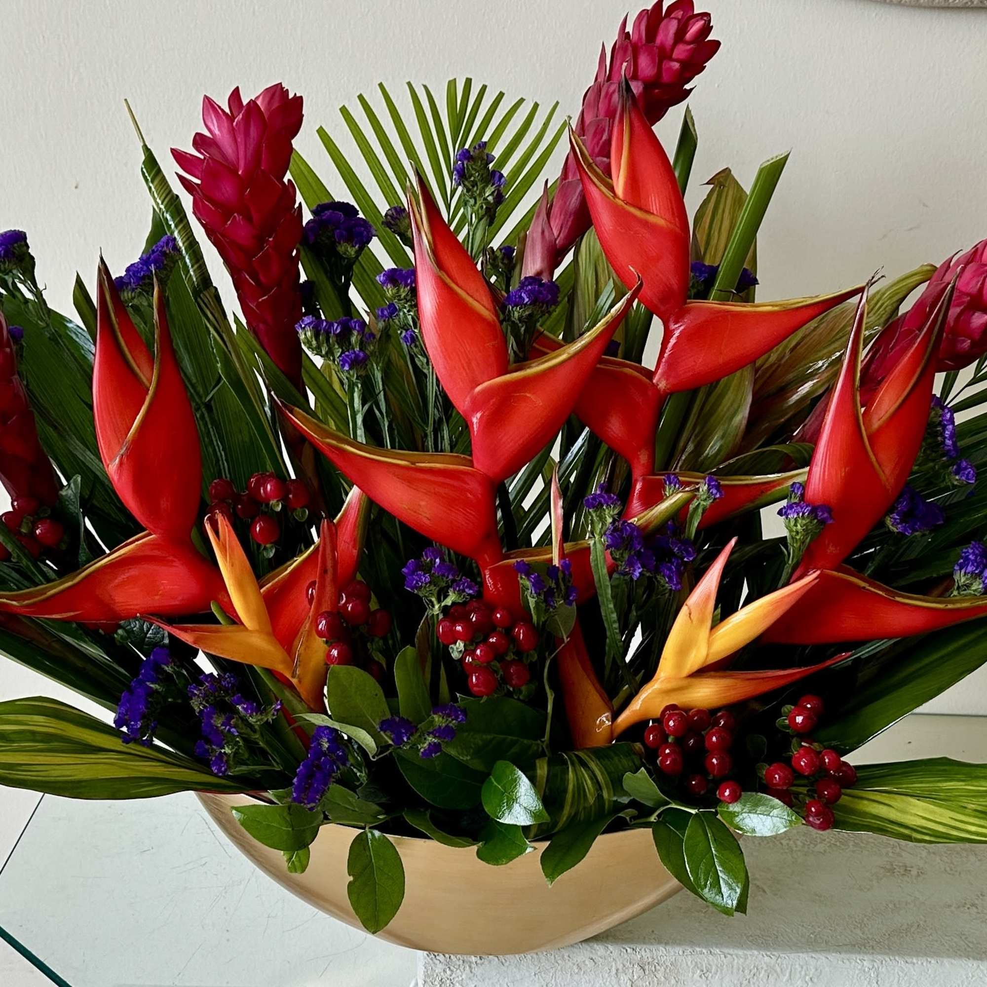 Tropical flowers for a centerpiece arranged low. Ideal for an Event and