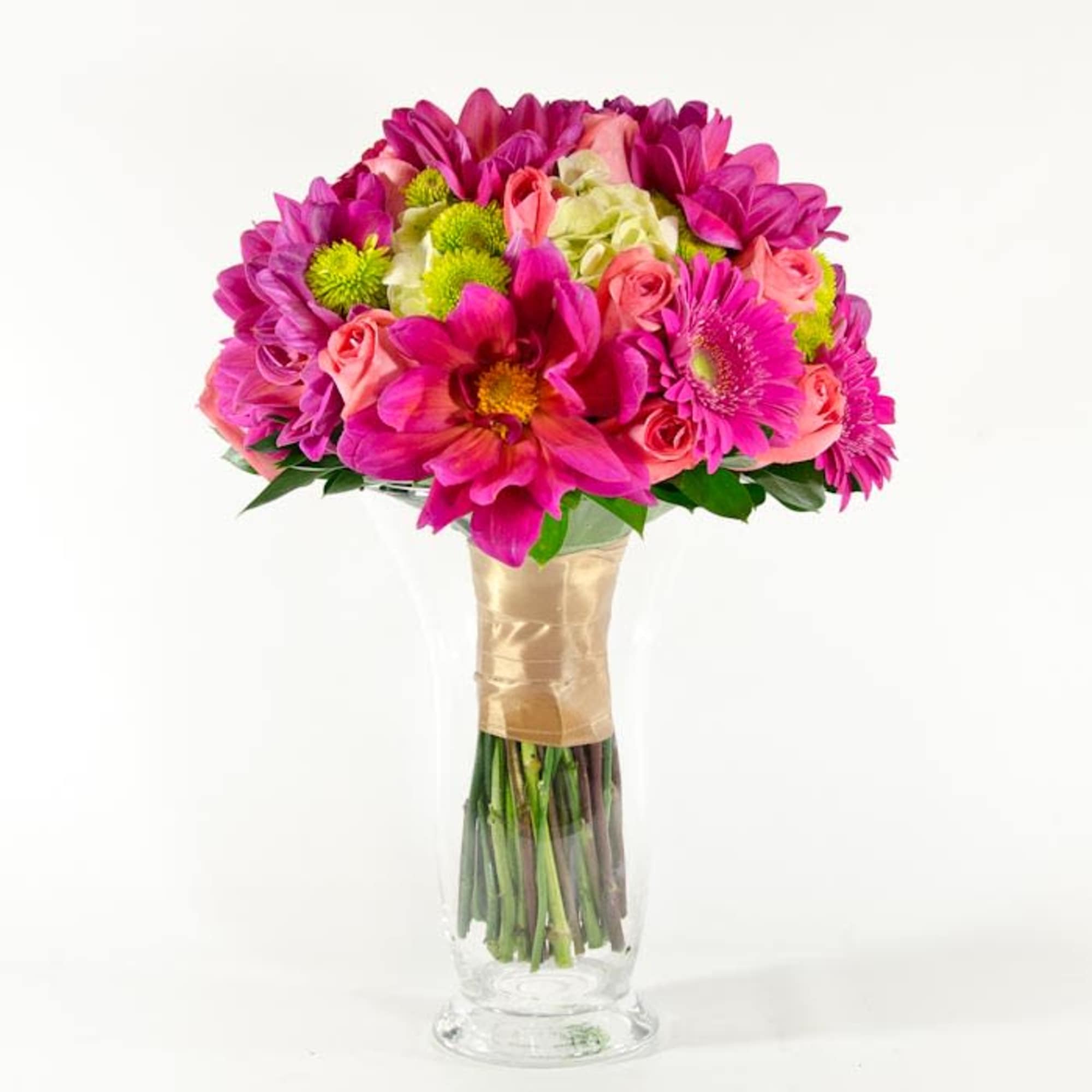 Pink and magenta mixed bouquet in a clear glass vase