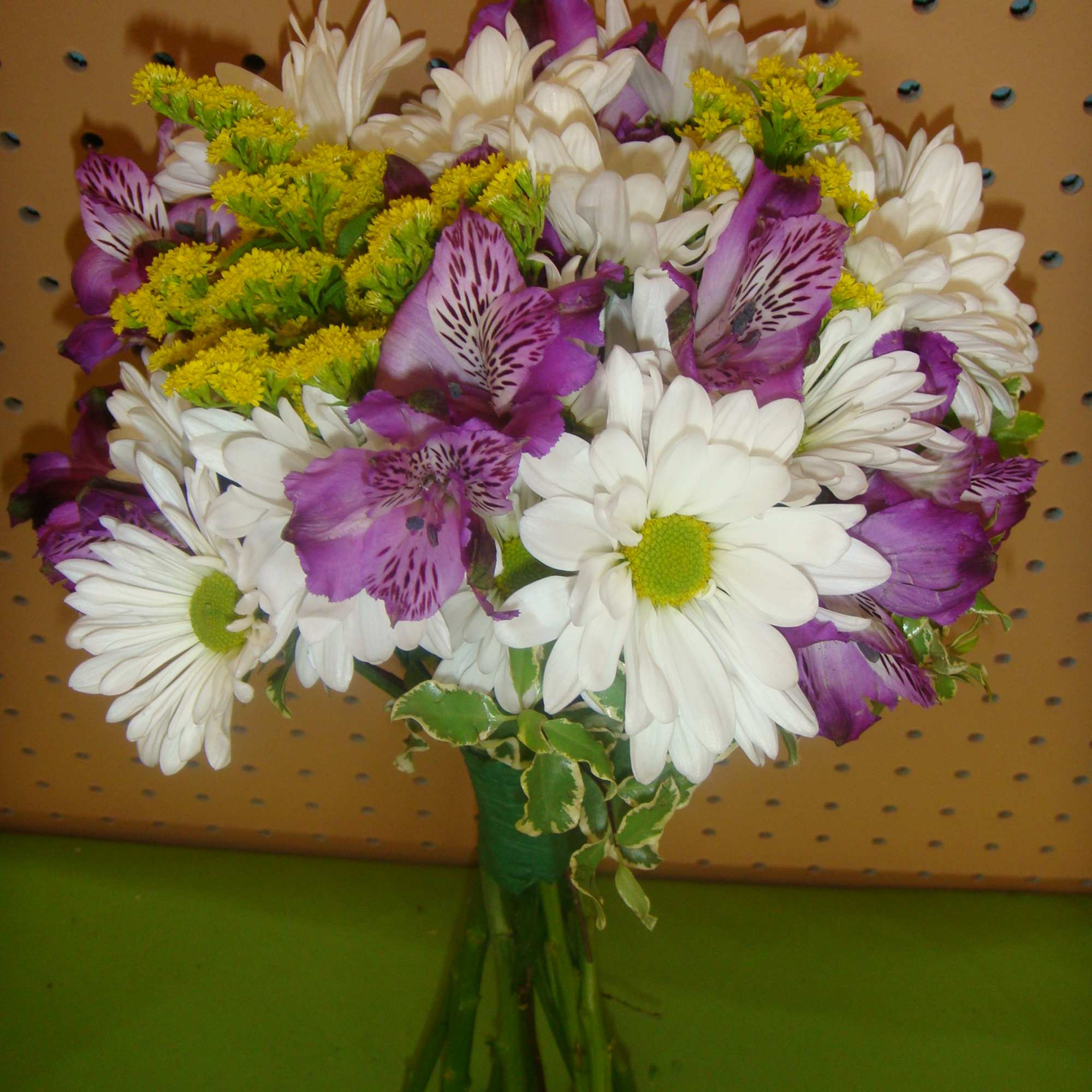 Bouquet of white daisies and purple alstroemeria with yellow filler flowers