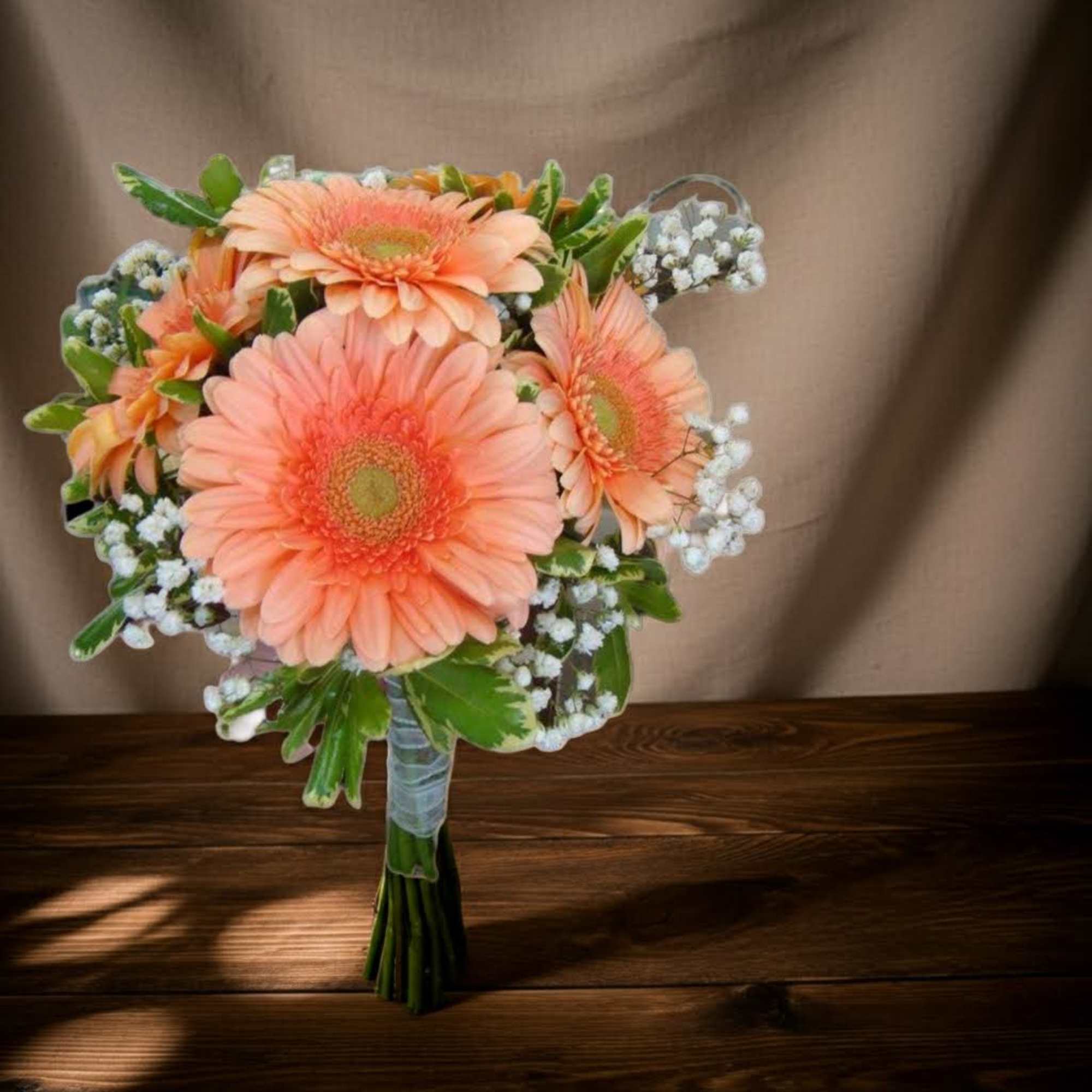 Peach gerbera daisy bouquet with white filler flowers
