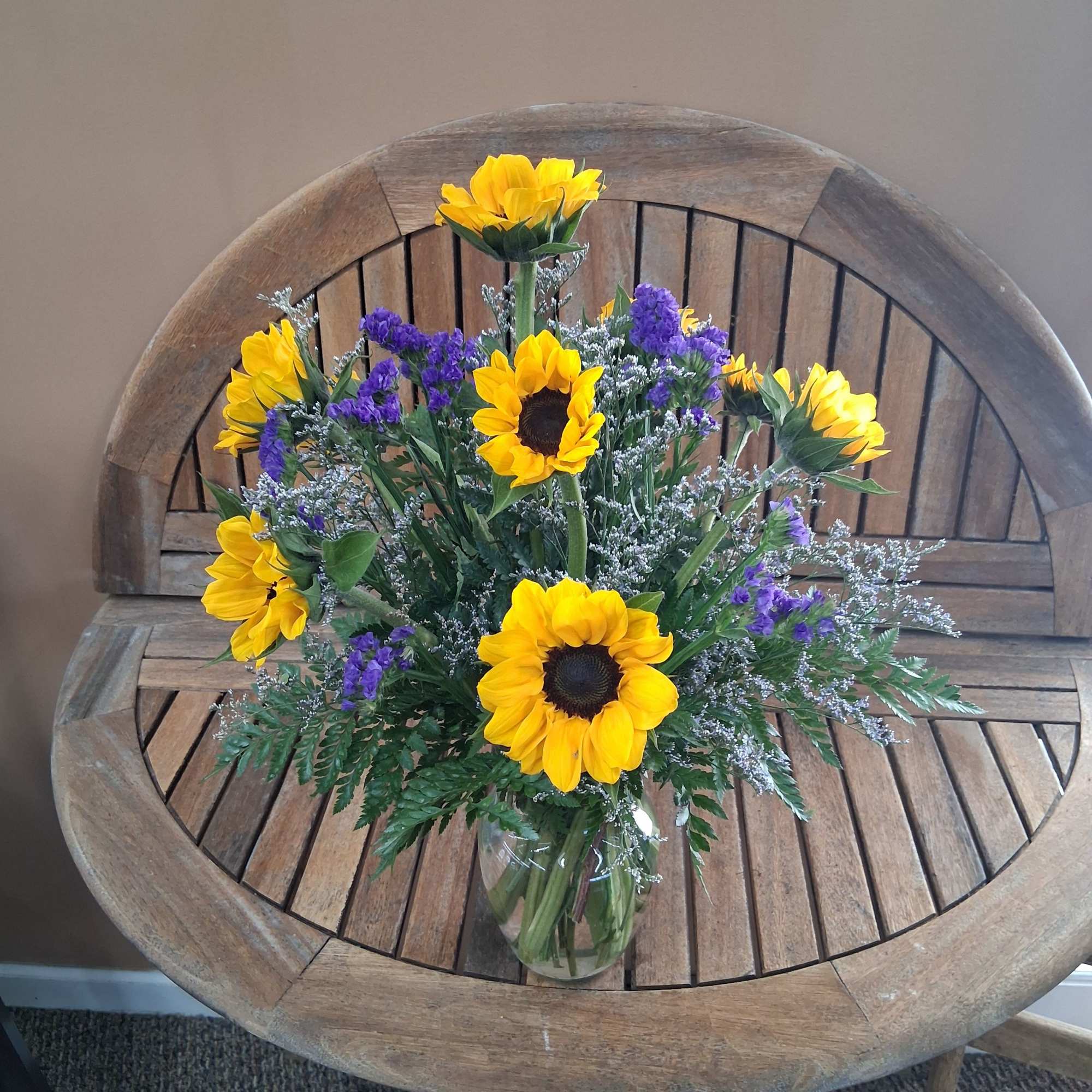 Golden sunflowers take center stage in this cheerful flower arrangement, brightening any, photo 2 of 3