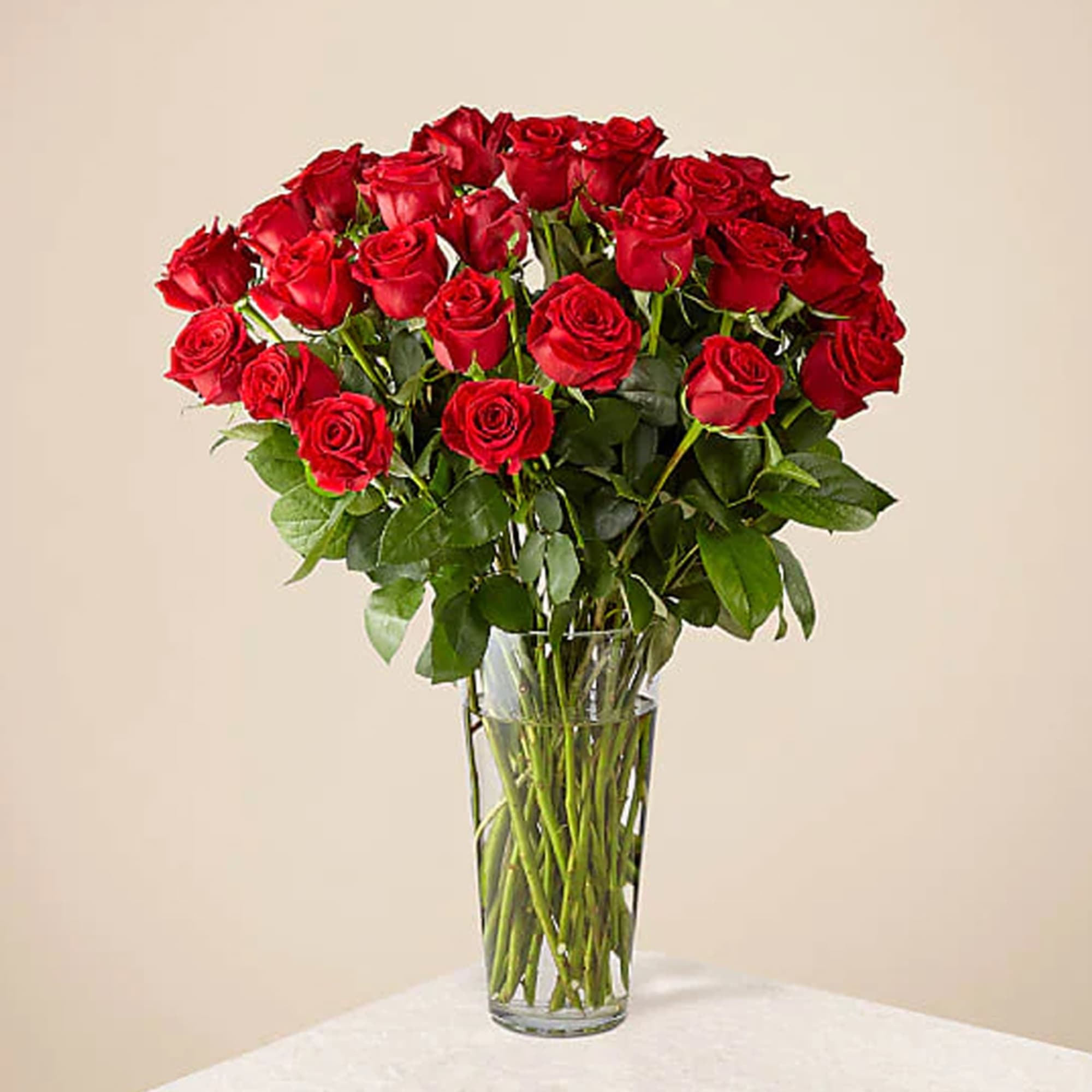 Bouquet of red roses in a clear glass vase