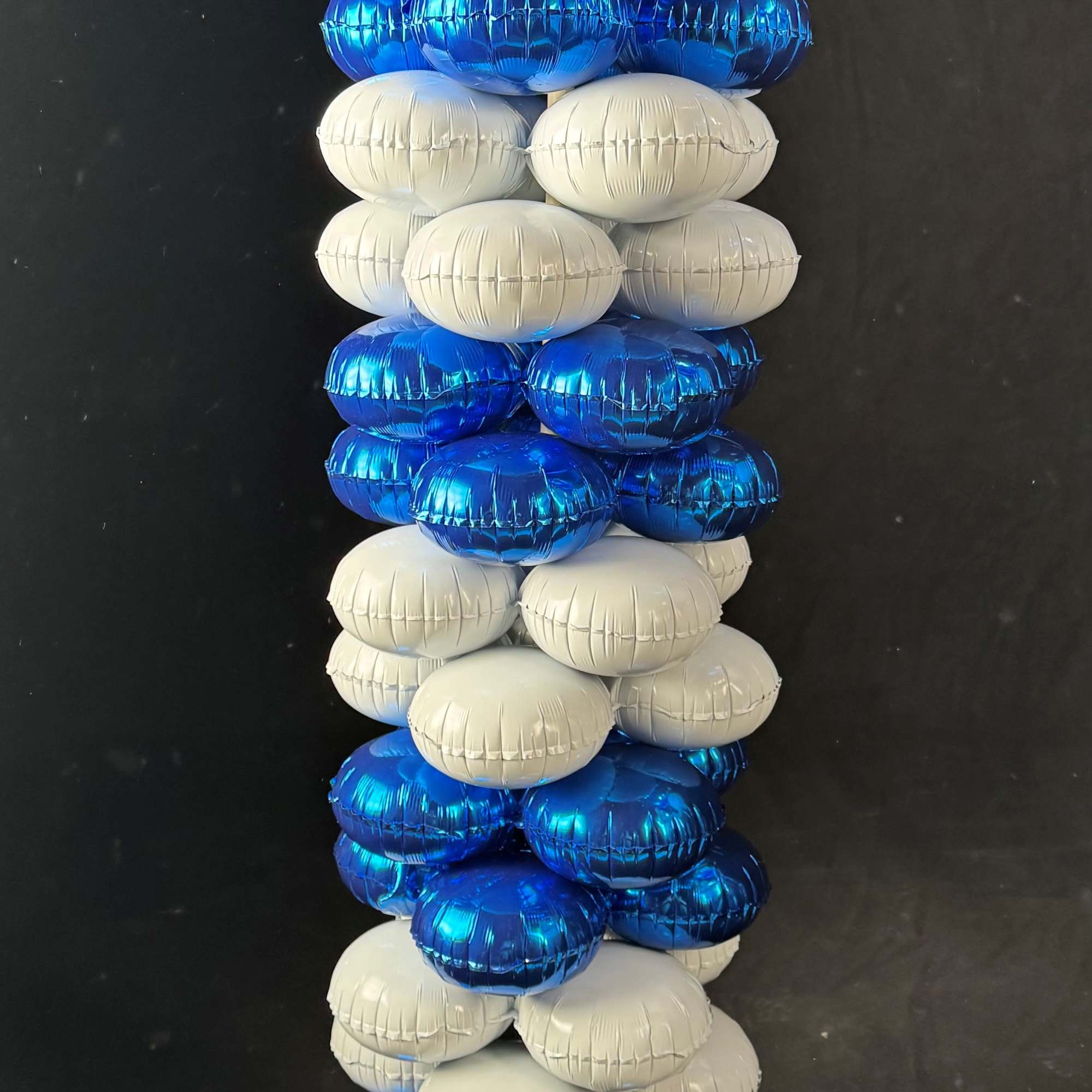 Make a statement with this eyecatching balloon tower.  * Deluxe and