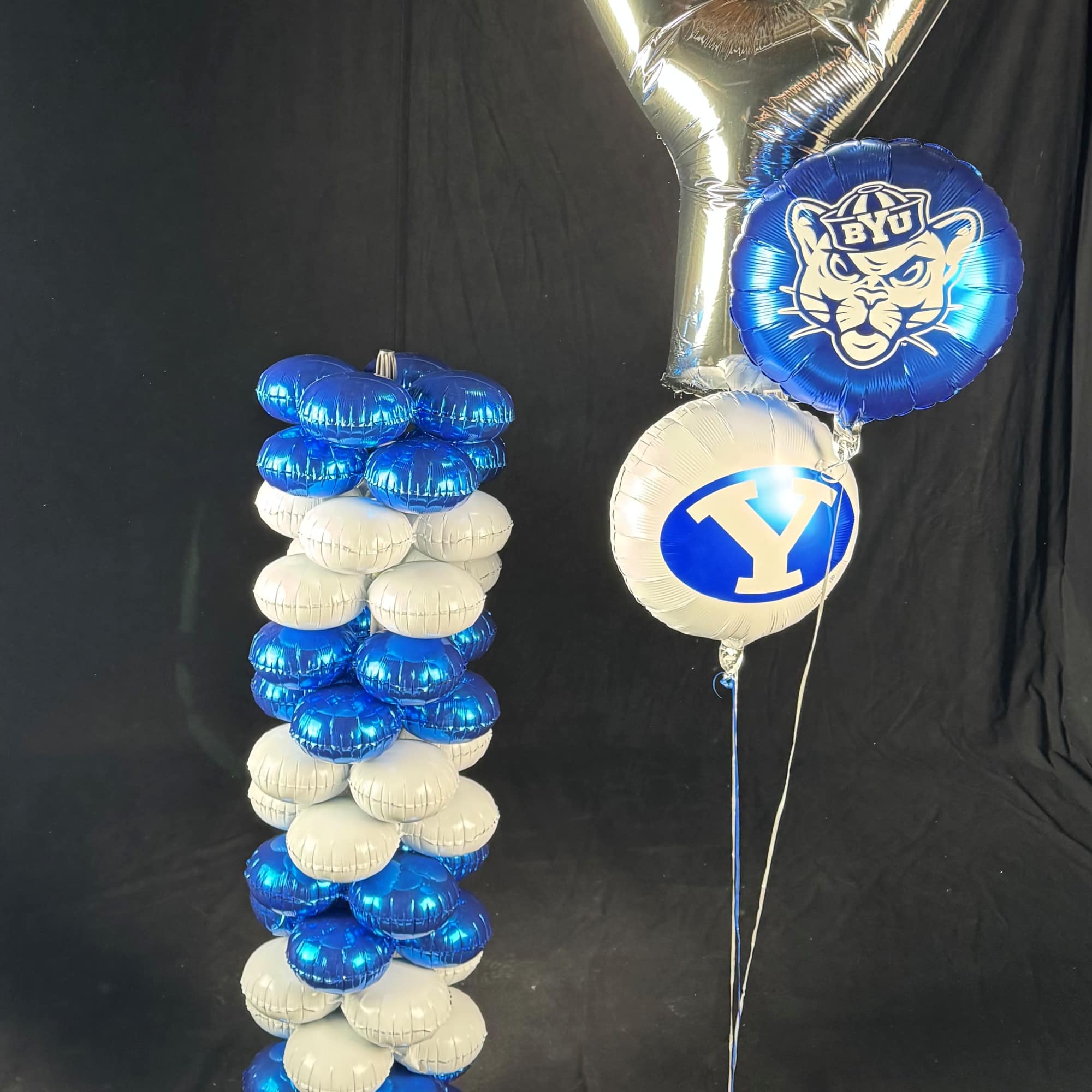 Make a statement with this eyecatching balloon tower.  * Deluxe and