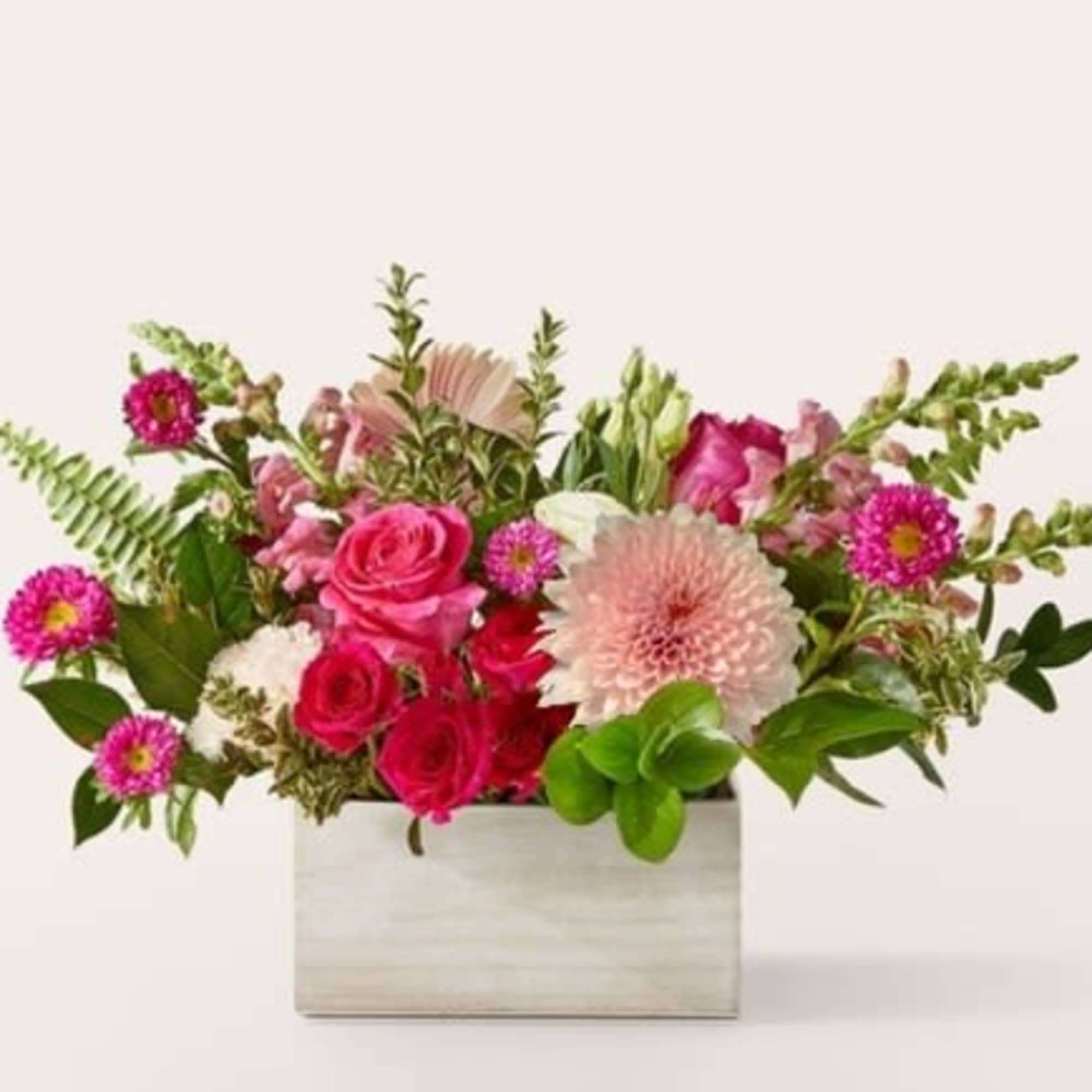 Sweet as can be, this blushing bouquet of pink blooms is an
