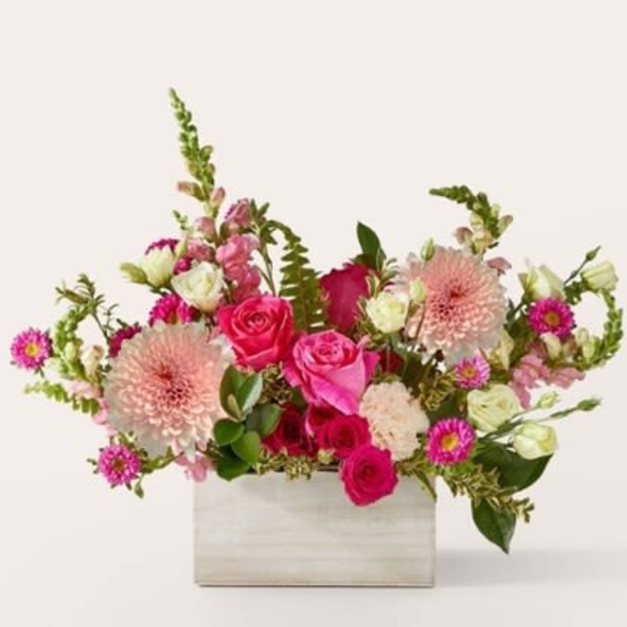 Sweet as can be, this blushing bouquet of pink blooms is an