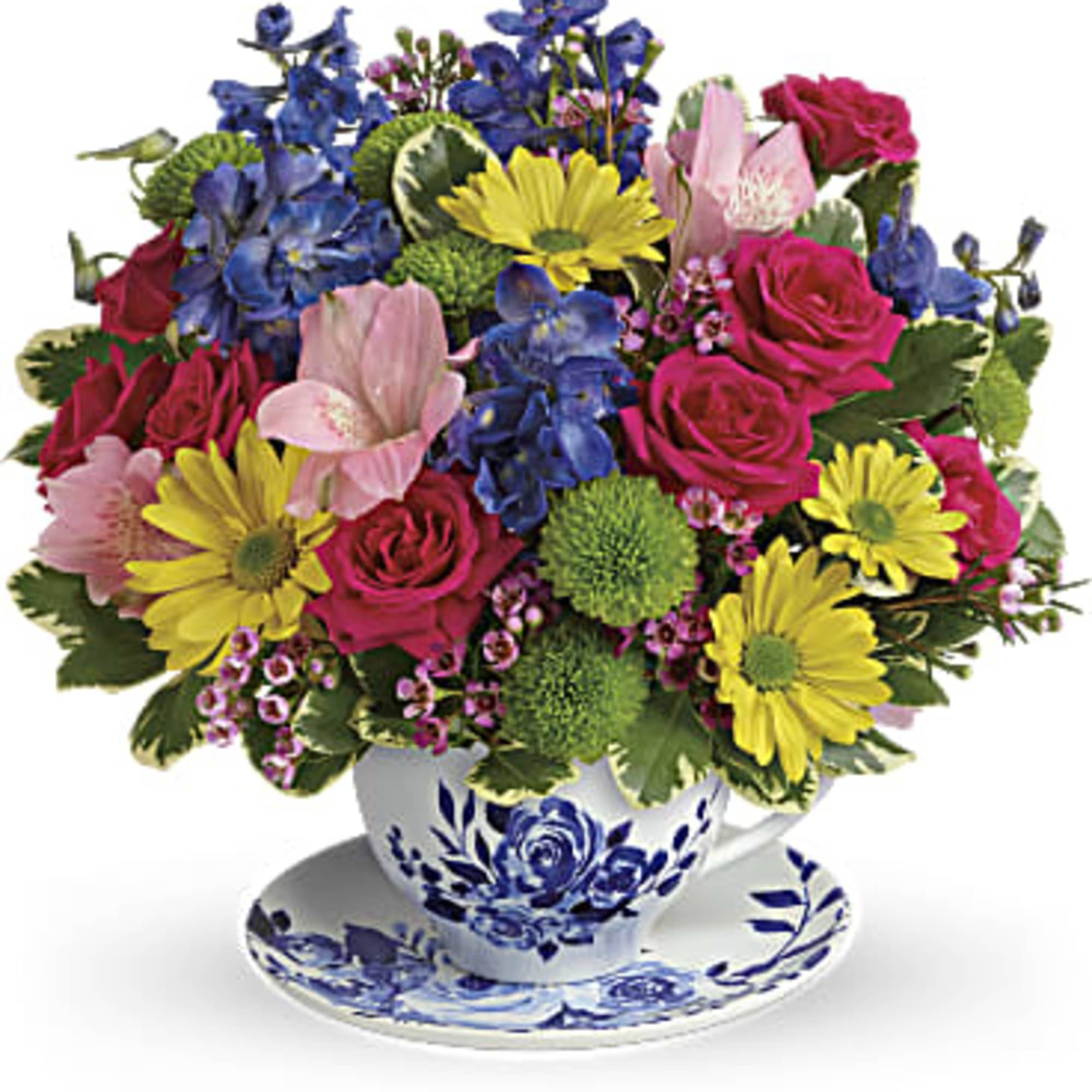 Mixed bouquet in a blue-and-white teacup and saucer
