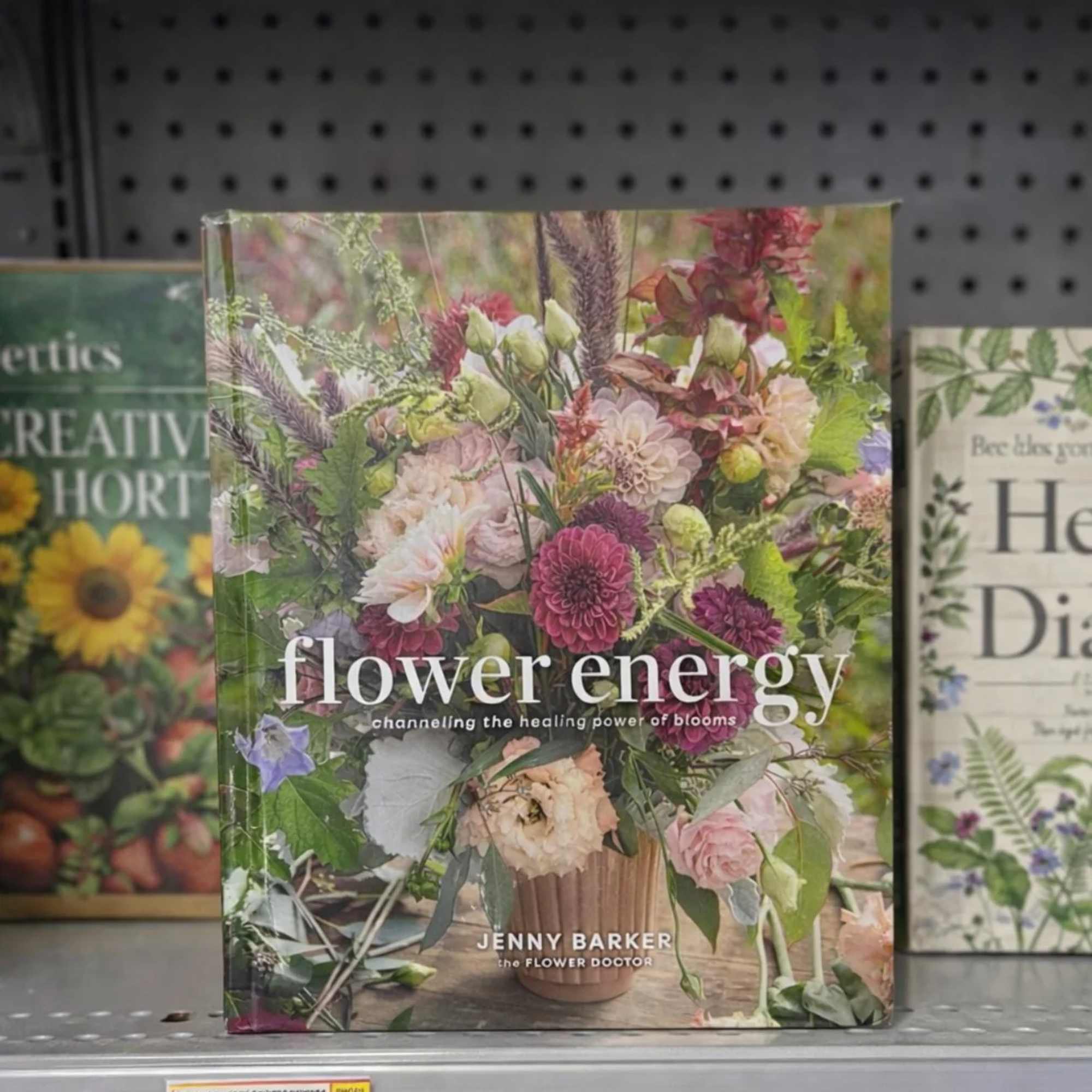 Flower arrangement book with a colorful bouquet on the cover