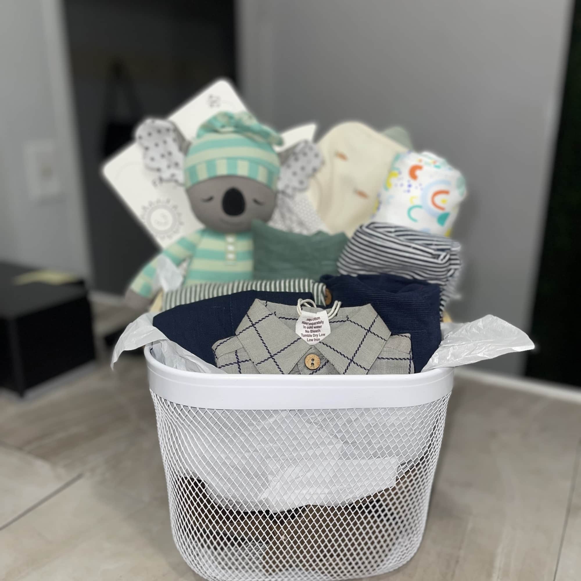Soft neutrals washed with navy, mint and pastel accents make this baby, photo 2 of 2