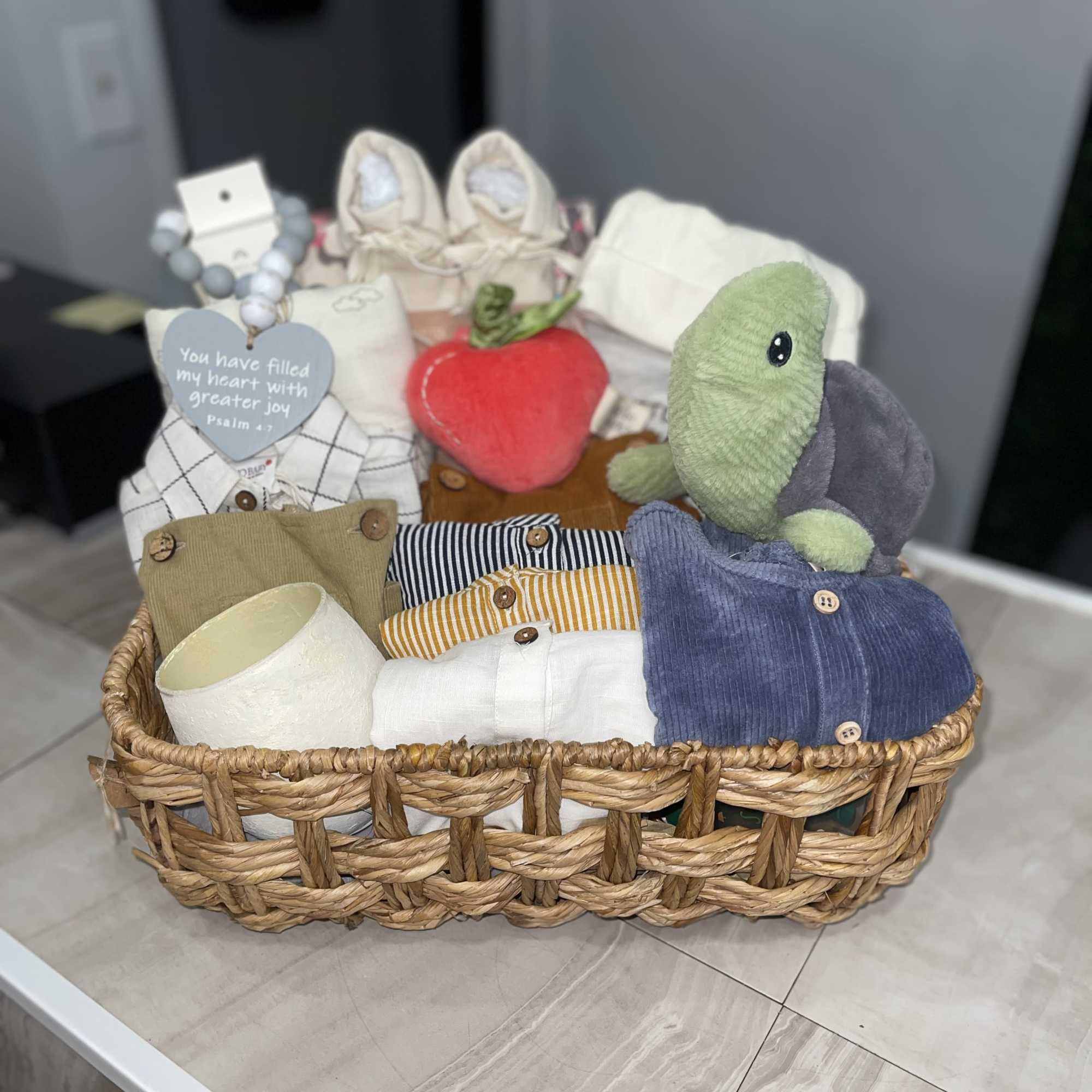 Soft neutrals washed with navy, mint and pastel accents make this baby