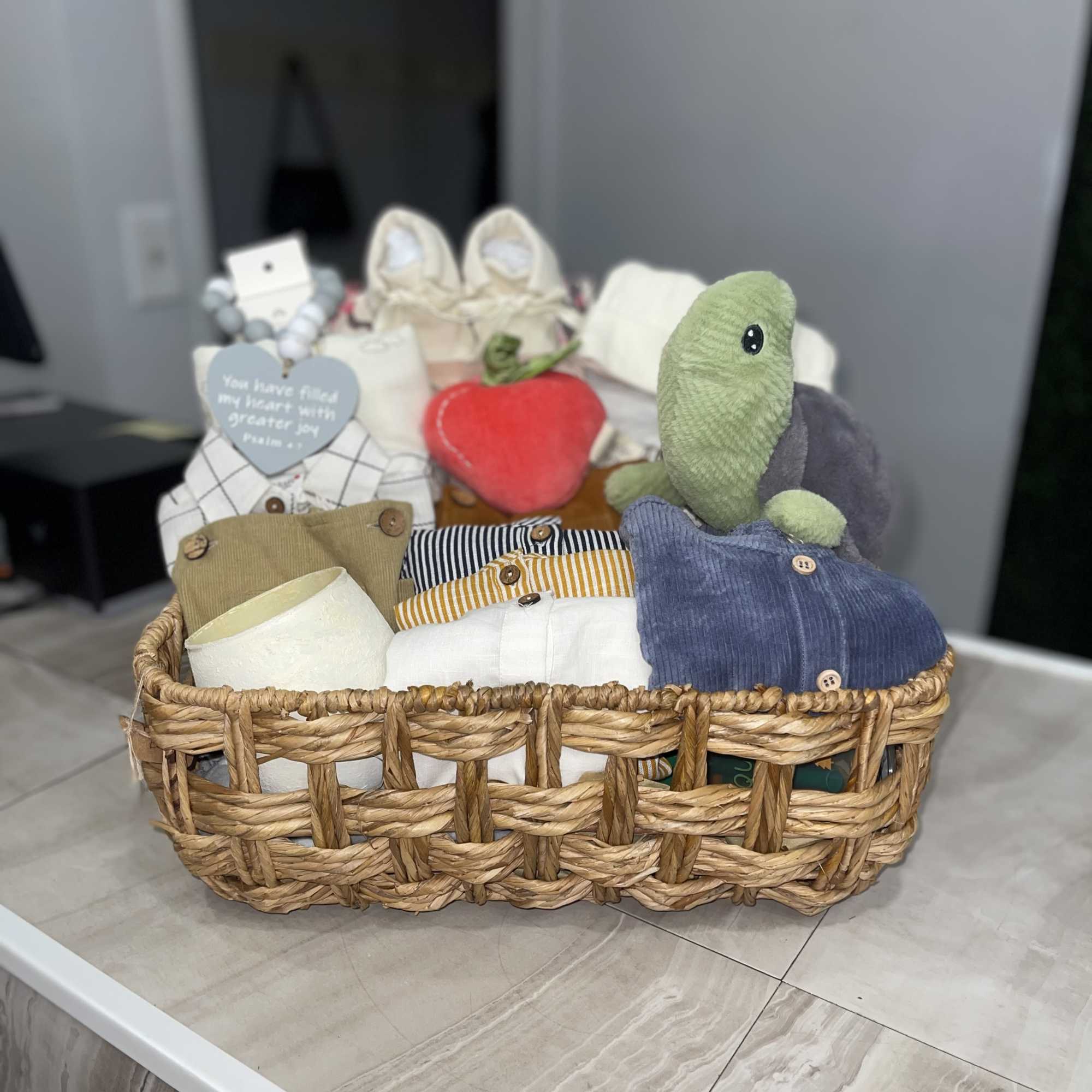 Soft neutrals washed with navy, mint and pastel accents make this baby, photo 2 of 2