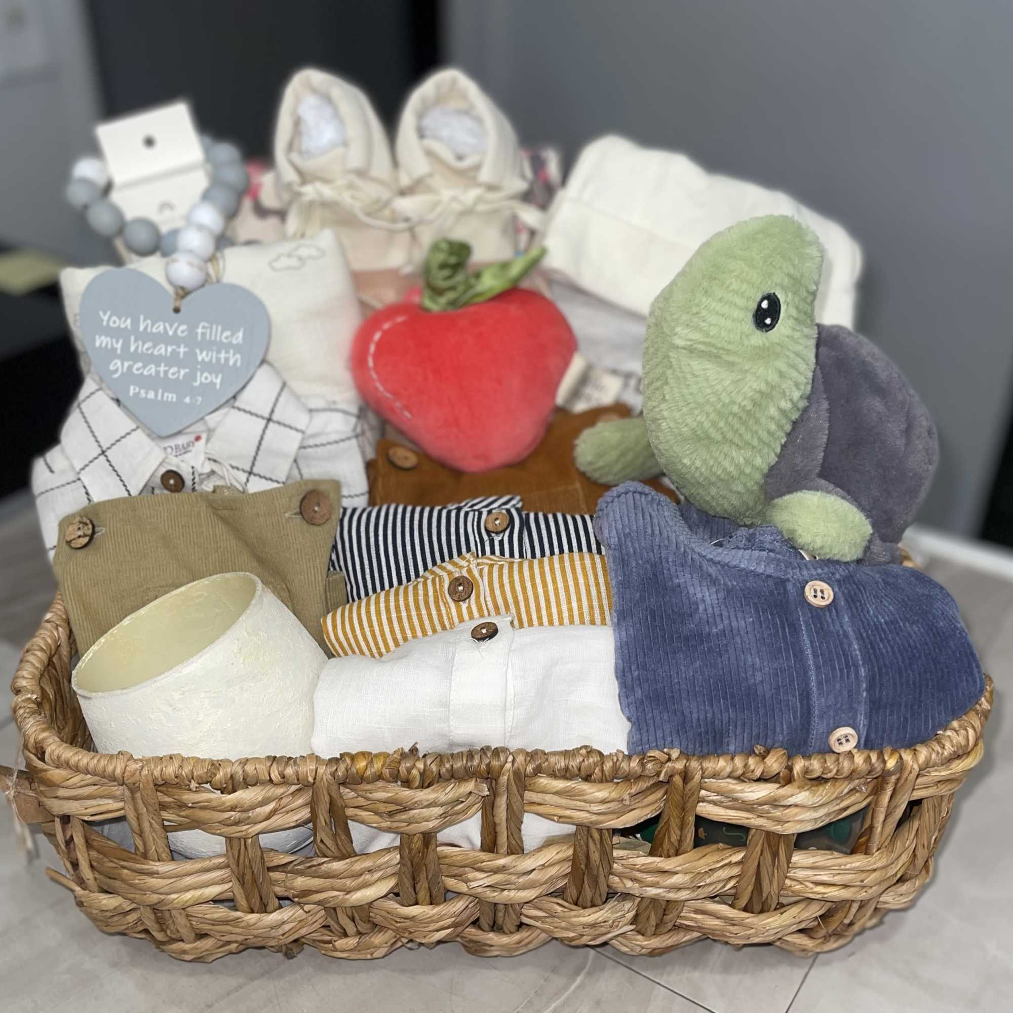 Soft neutrals washed with navy, mint and pastel accents make this baby