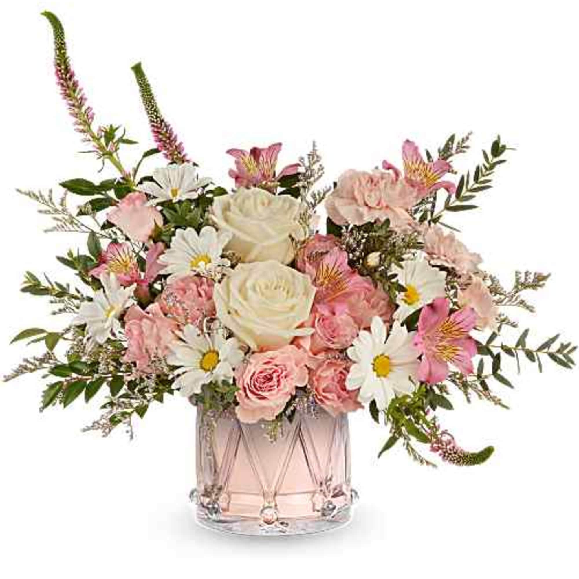 Pink and white mixed bouquet in a clear glass vase