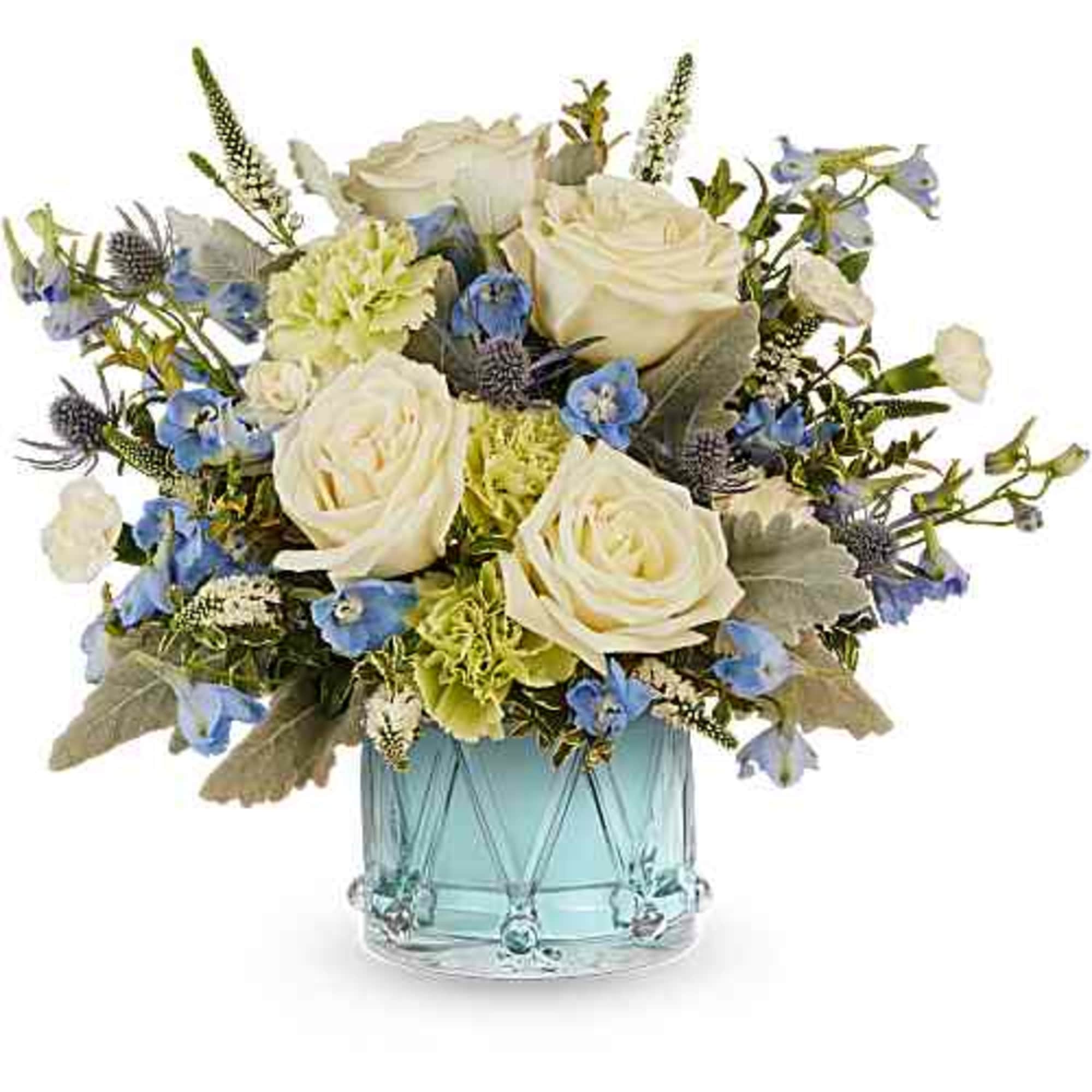 White roses and blue flowers arranged in a light blue glass vase