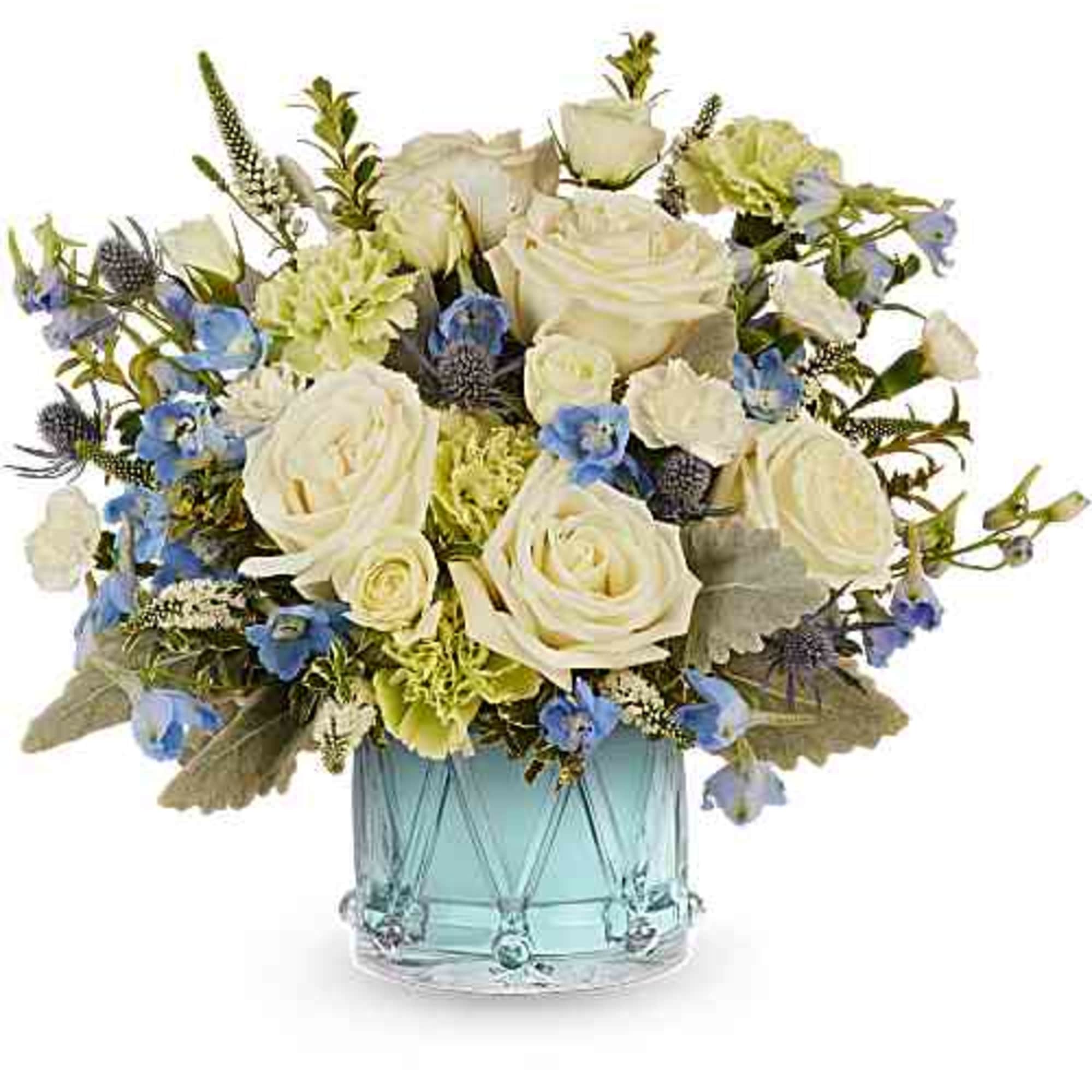 White roses and blue flowers arranged in a blue glass vase