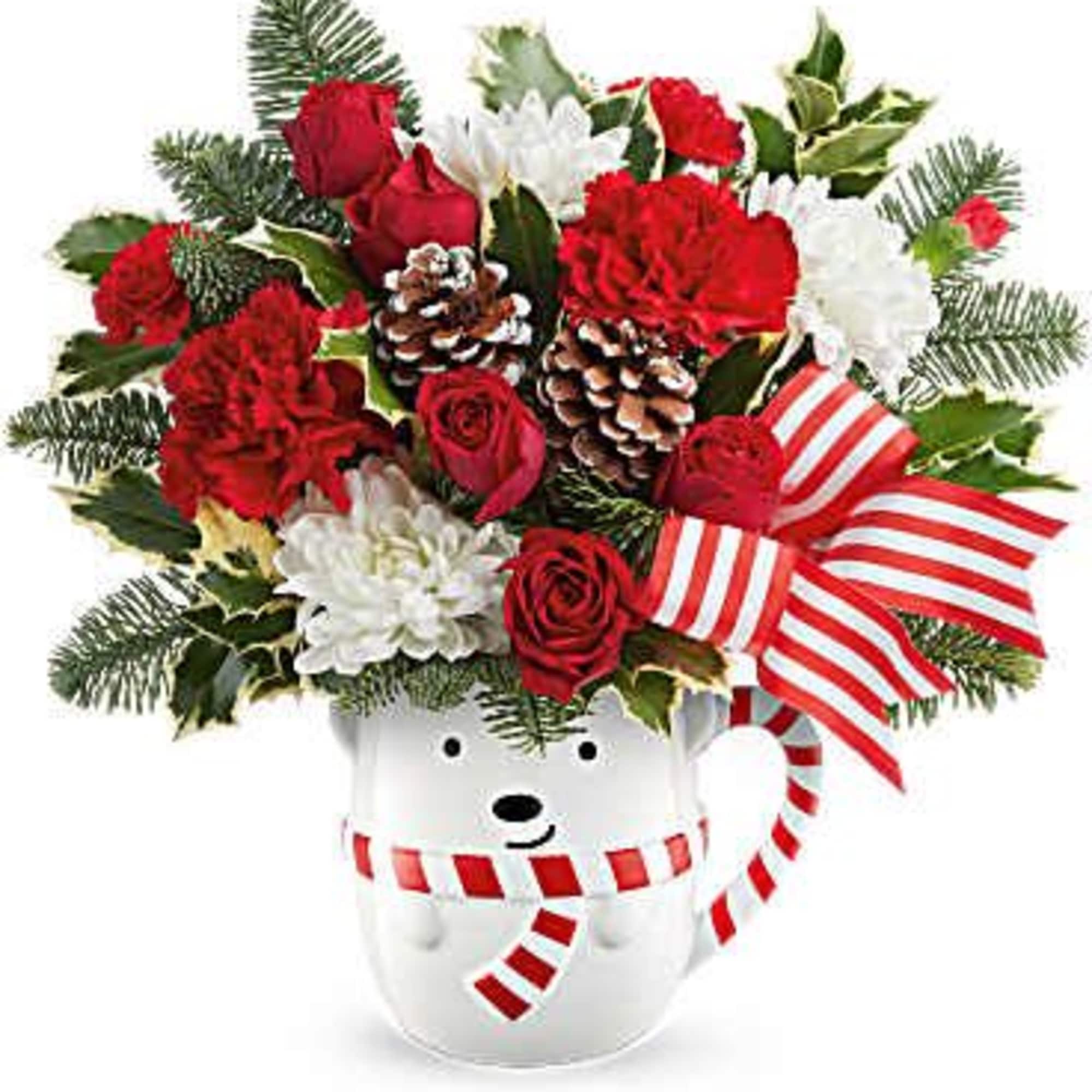 This cheerful red and white bouquet in an adorable bear cup will