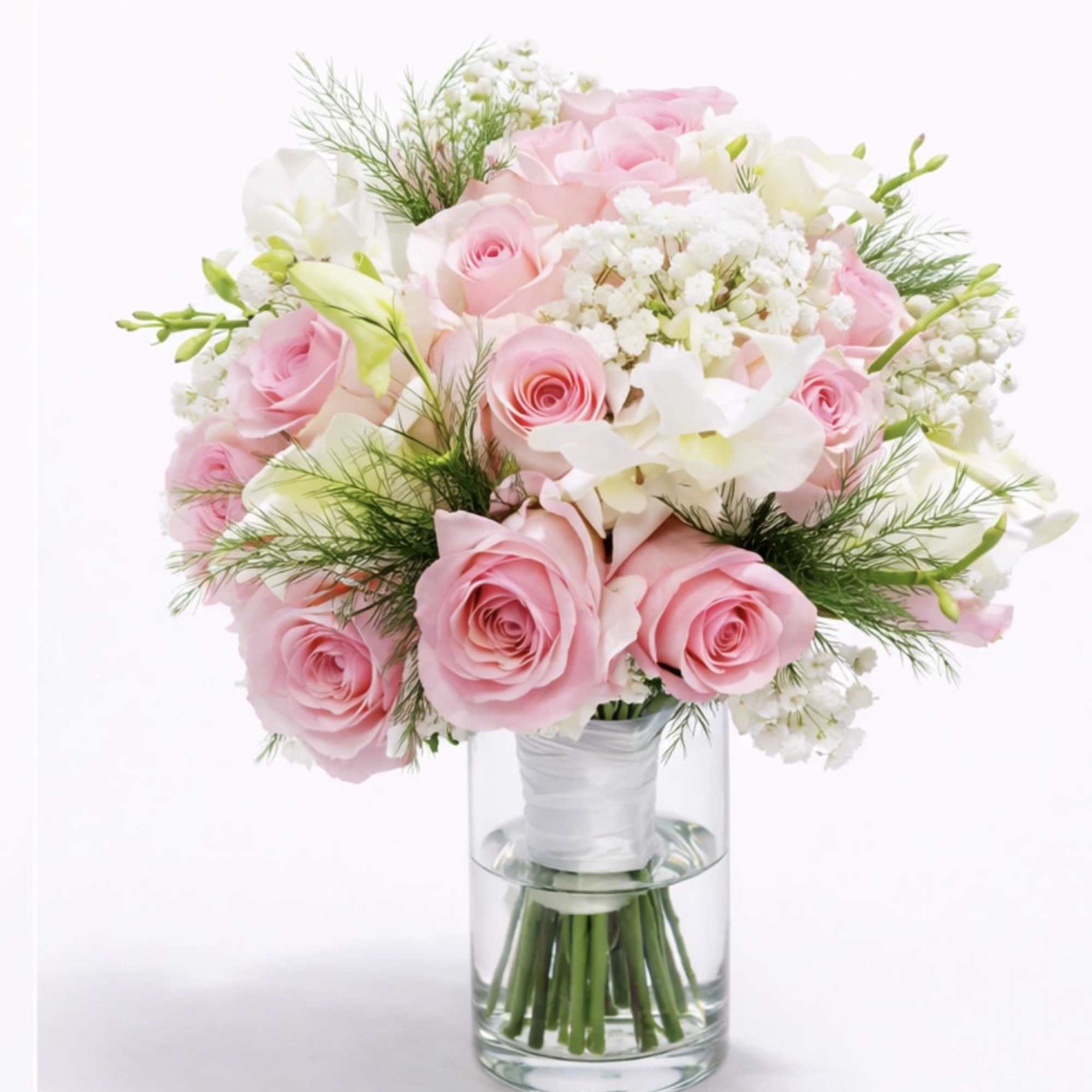 A romantic garden-style bridal bouquet crafted with vibrant pink roses, delicate white, photo 2 of 2