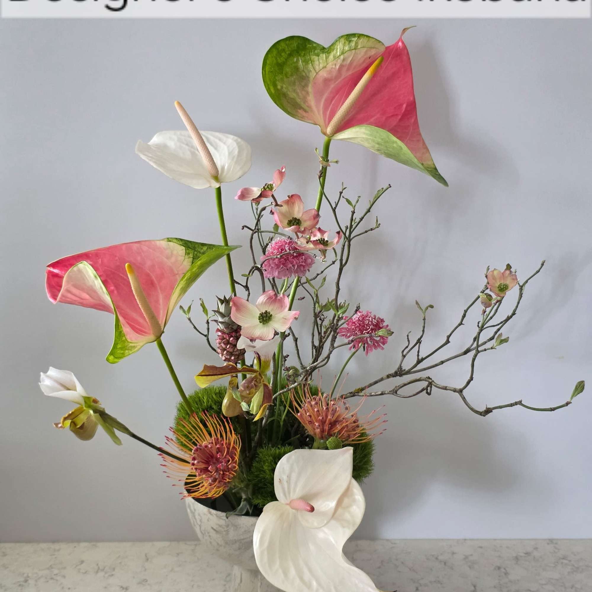 A contemporary take on floral gift-giving, this Designer's Choice Ikebana arrangement brings