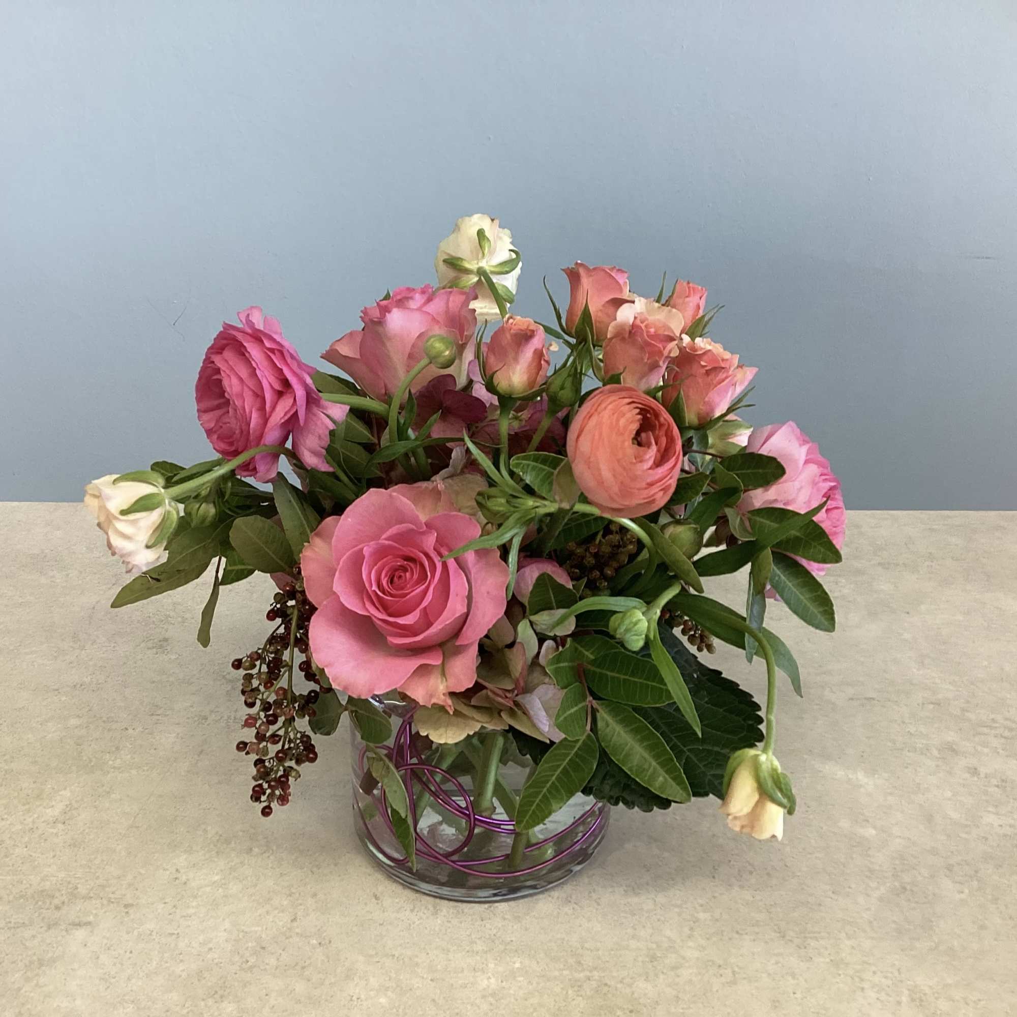 A compact garden-style arrangement in soft pinks, peaches and fresh green, Meadow, photo 2 of 2