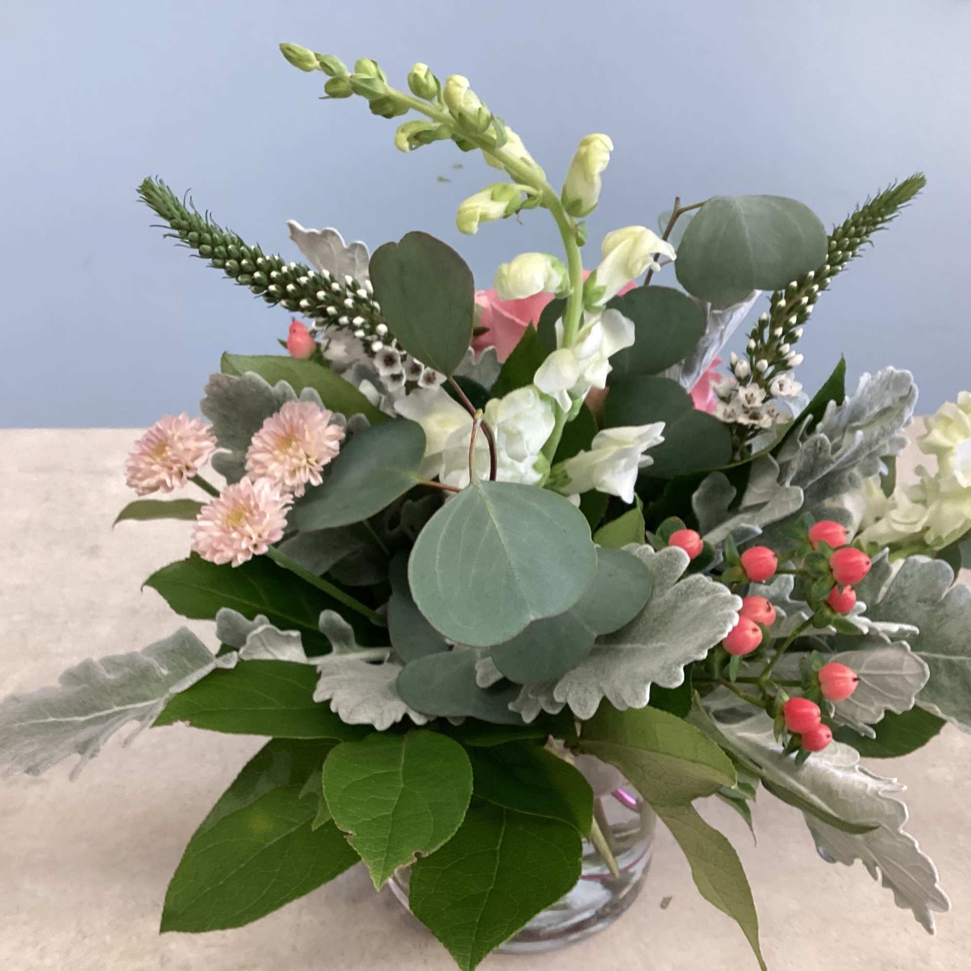 A low-profile arrangement featuring roses., photo 2 of 2