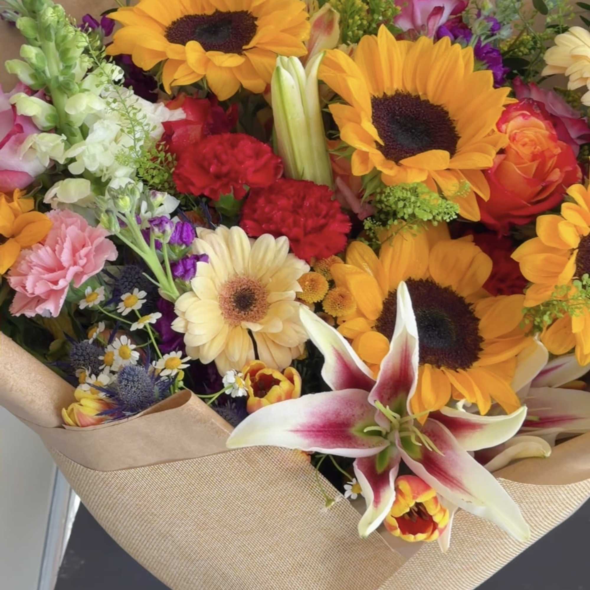 Radiant Summer Bloom is a vibrant bouquet featuring cheerful sunflowers, elegant lilies, photo 3 of 4