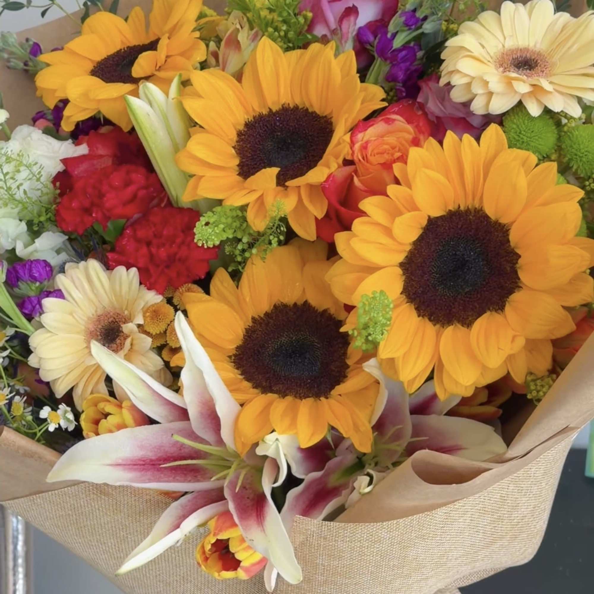 Radiant Summer Bloom is a vibrant bouquet featuring cheerful sunflowers, elegant lilies, photo 4 of 4