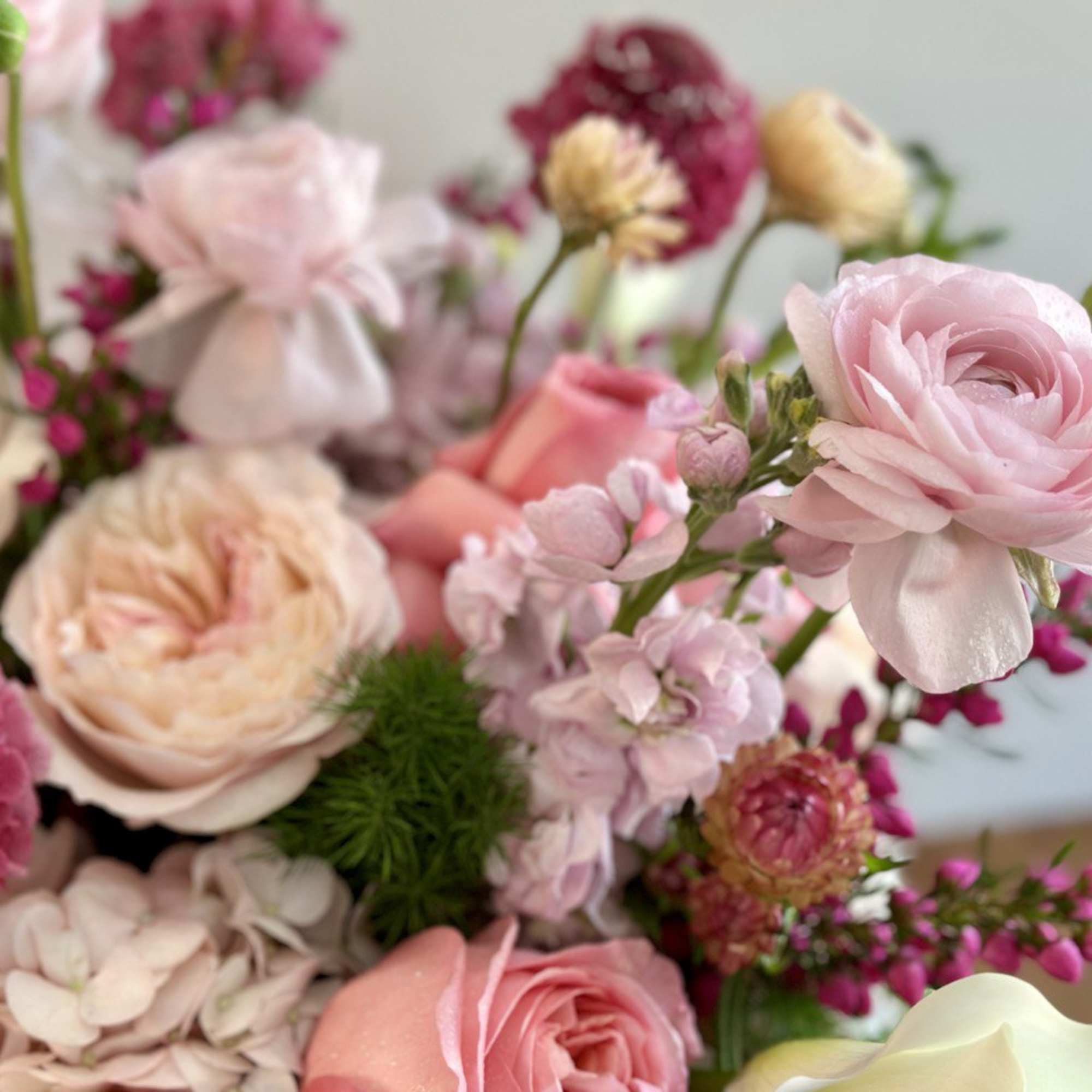Pink and cream bouquet with roses and mixed blooms