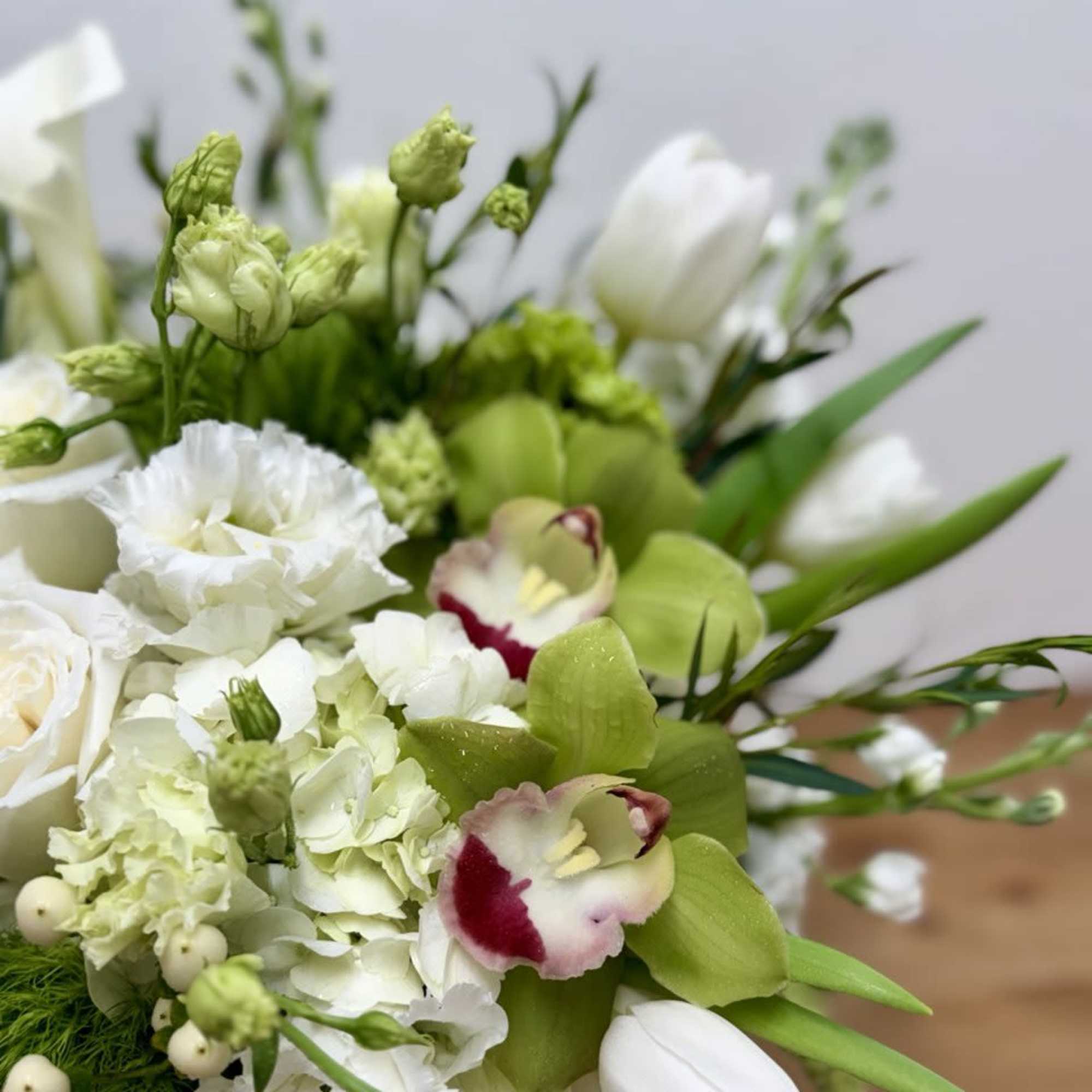 White and green bouquet with orchids and tulips