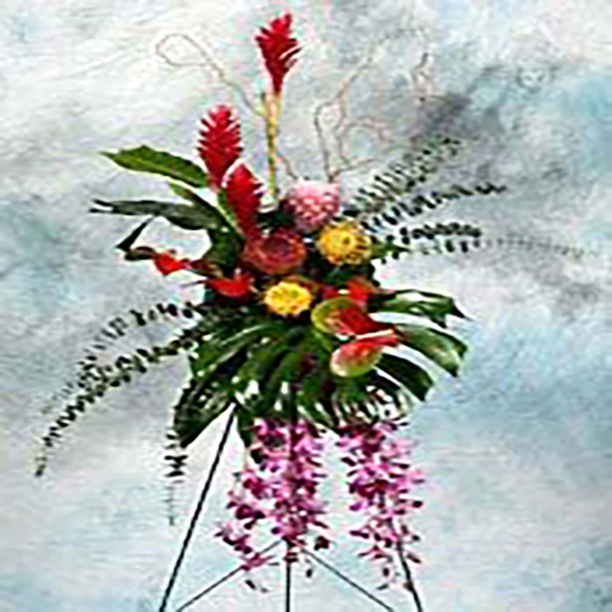 Tall tropical standing spray with red flowers, yellow blooms, large tropical leaves, and cascading purple orchids on an easel.
