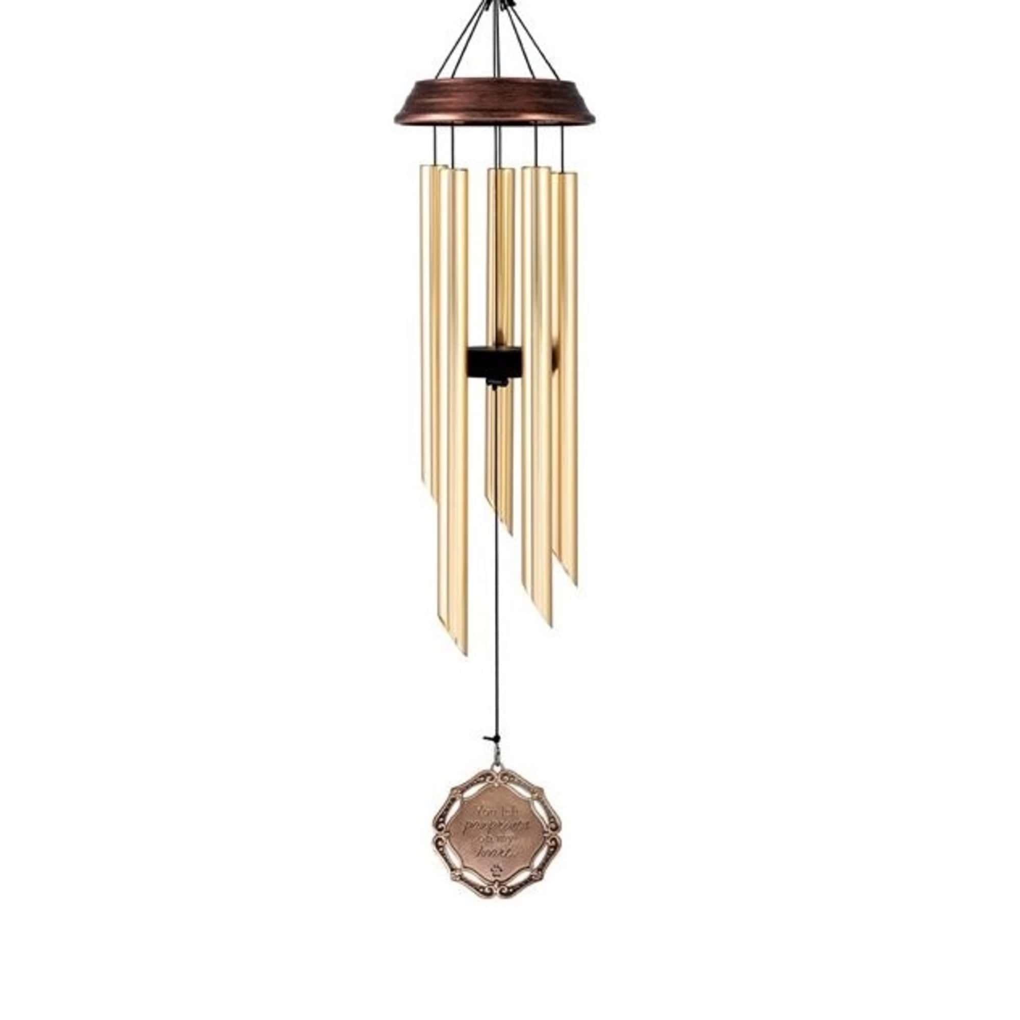 Hanging metal wind chime with gold tubes and a decorative medallion