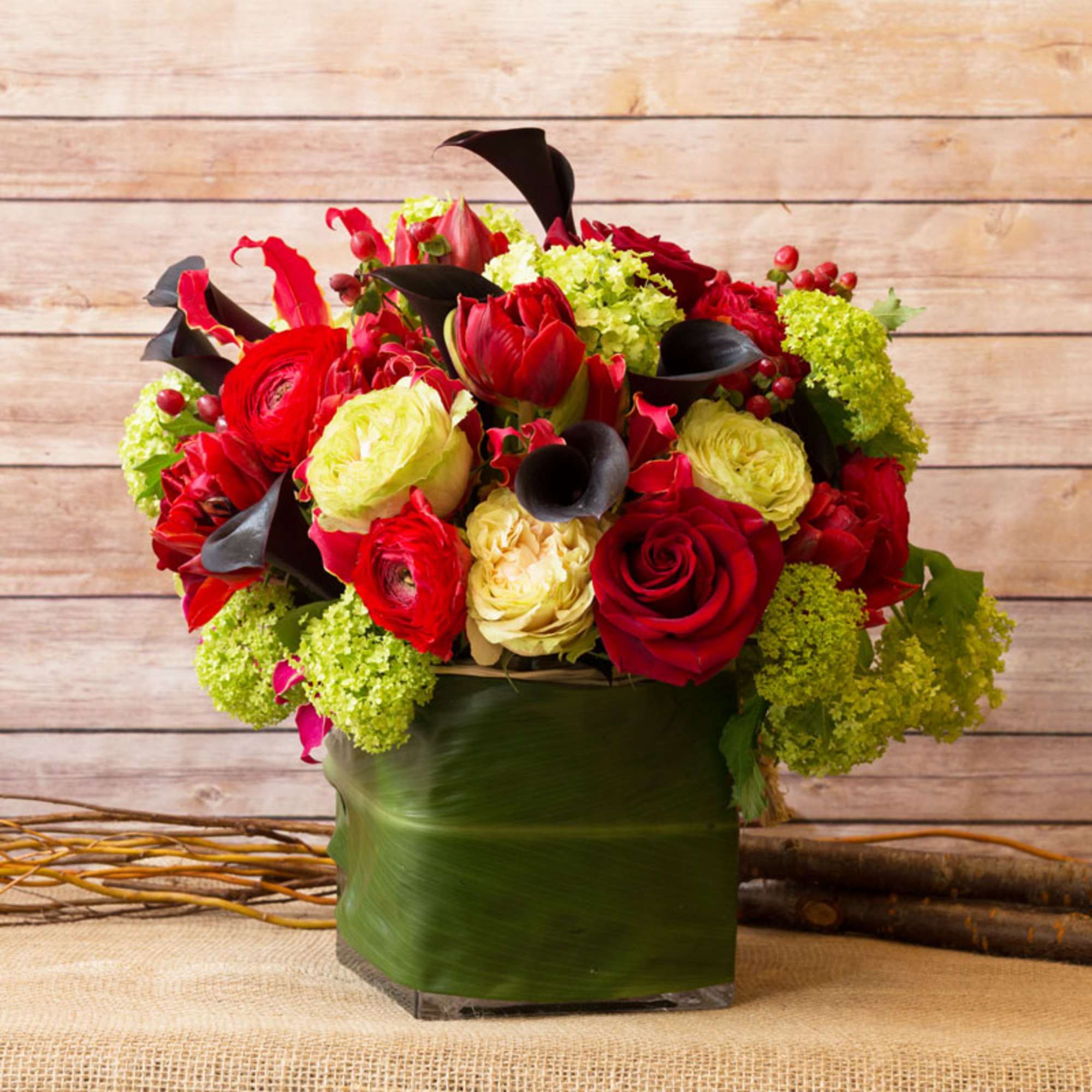 COLORFUL CUBE ARRANGEMENT WITH CALLA LILIES, ROSES, VIBURNUM, GLORIOSA LILIES, RANANCULUS, AND, photo 2 of 2
