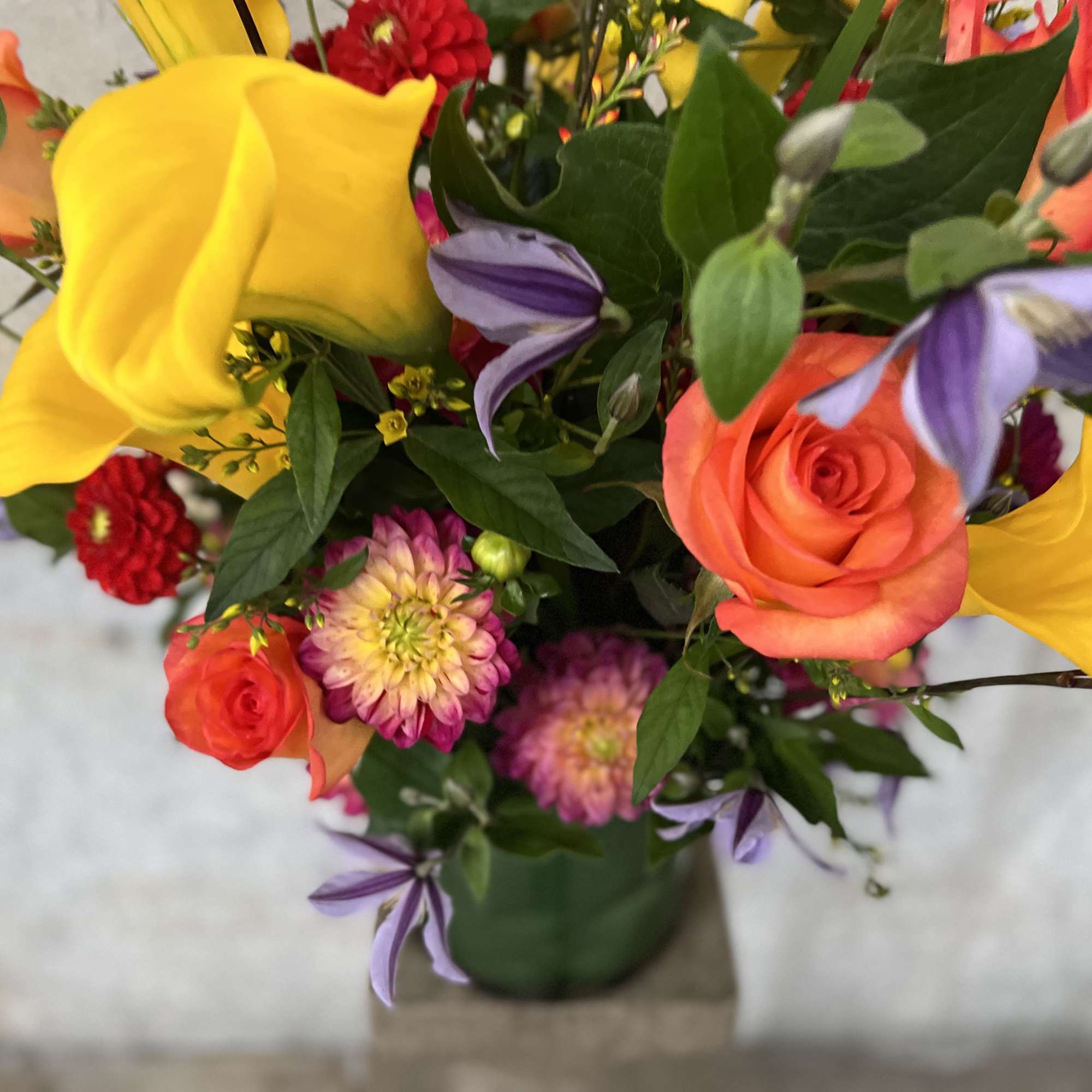 Medium to tall composition assortment of yellow captain calla lily's, yellow lysimachia, photo 5 of 10