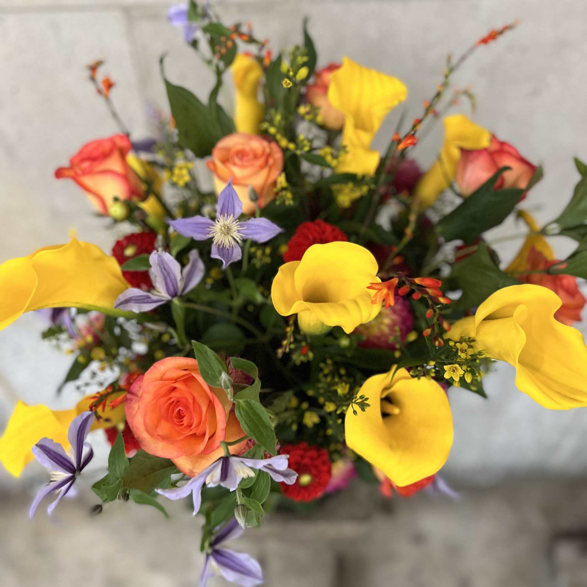 Medium to tall composition assortment of yellow captain calla lily's, yellow lysimachia, photo 6 of 10