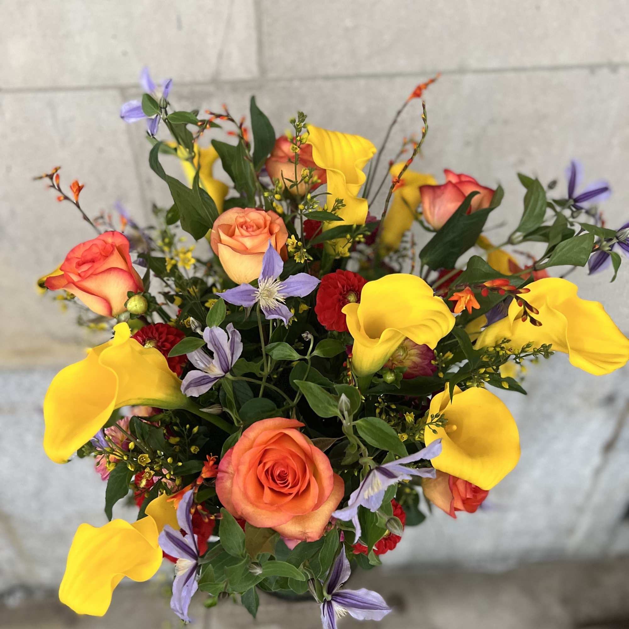 Medium to tall composition assortment of yellow captain calla lily's, yellow lysimachia, photo 8 of 10