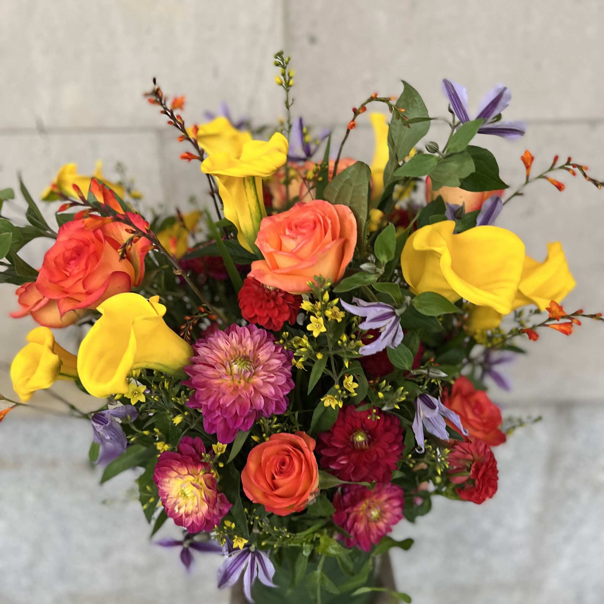 Medium to tall composition assortment of yellow captain calla lily's, yellow lysimachia, photo 10 of 10